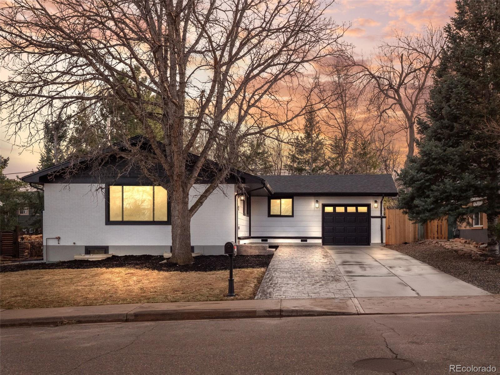Beautifully updated home nestled in the highly sought-after Table Mesa neighborhood of Boulder, offering stunning mountain views. This exceptional 5-bedroom, 3-bath residence showcases elevated finishes throughout, including hand-textured walls, rich hardwood floors, and thoughtfully designed custom cabinetry. The home is entirely carpet-free, offering a clean, modern aesthetic and effortless maintenance. The dining area is equally well-appointed, featuring additional custom cabinetry for ample storage and a built-in mini fridge & sink perfect for entertaining and everyday convenience.The spacious primary suite is a true retreat, featuring a luxurious five-piece bathroom with a standalone soaking tub, and an expansive walk-in closet designed for both comfort and functionality.Recent upgrades include a brand-new roof, new windows, new electrical panel, and a new HVAC system with central air conditioning, providing both comfort and peace of mind. Solid hardwood doors further enhance the home’s craftsmanship and timeless appeal.**** All work is permitted. The GC is offering 1 year warranty in all workmanship! The railing will be completed!