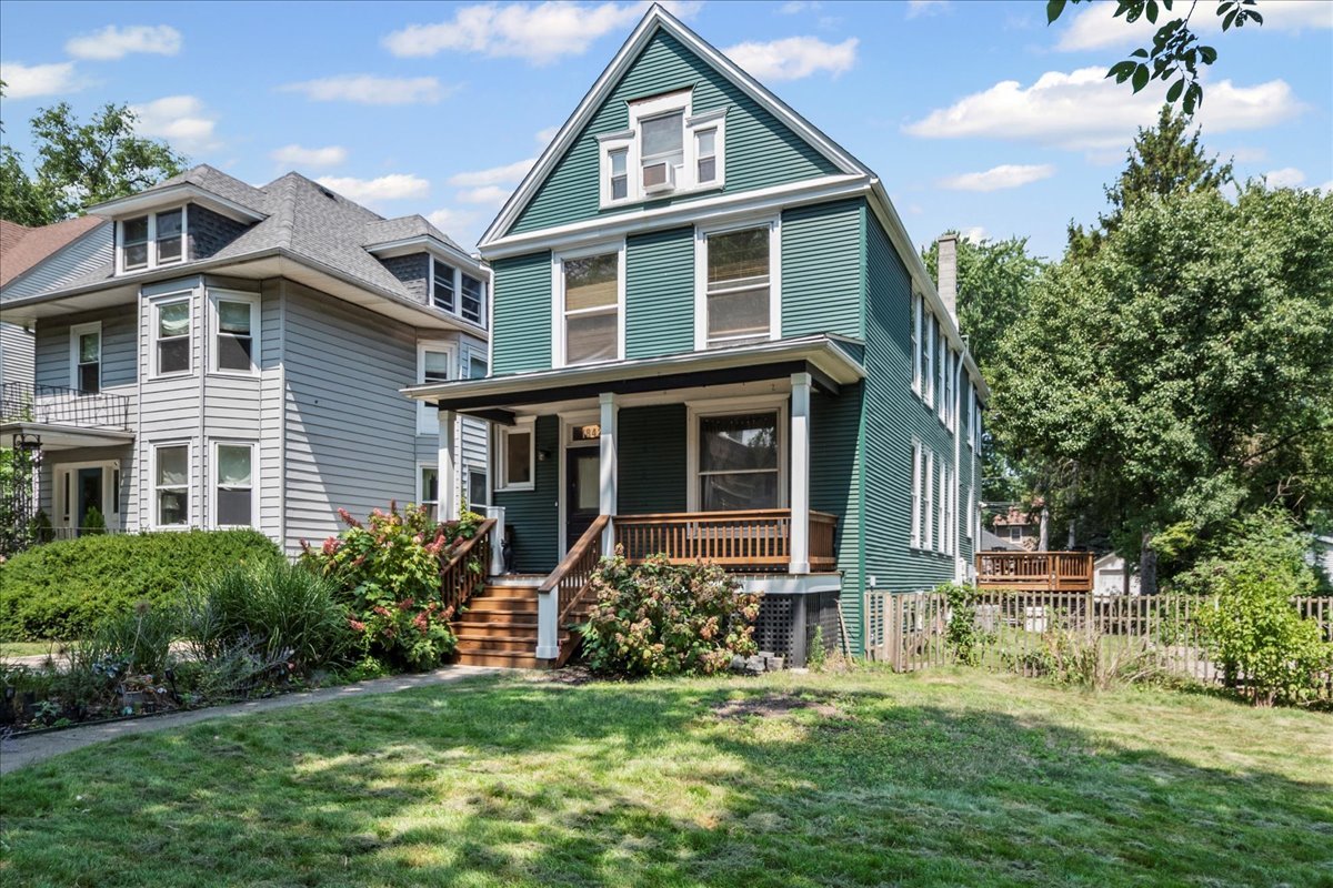 Rarely available!  Fabulous vintage 5 bed 3 1/2 home on a very deep double lot on a beautiful residential block near CTA public transportation and Metra station. Three levels of living space plus a full unfinished basement. Lots of vintage details with many modern and recent updates.  Main floor has living room, dining room, library/office, large updated eat-in kitchen and 1/2 bath.  Second floor with four bedrooms, sitting room/den, and 2 full baths.  Third floor attic space has been finished with family room, bedroom, a full bathroom.  Roof is 2 years old, dual zoned forced air heat and central air 3 years old, newer electric, newer hot water tank and washer and dryer, front and rear porches and decks are almost new, recently installed generator and solar panels.  The exterior of the home was recently painted. 2 car garage, back and side yards.