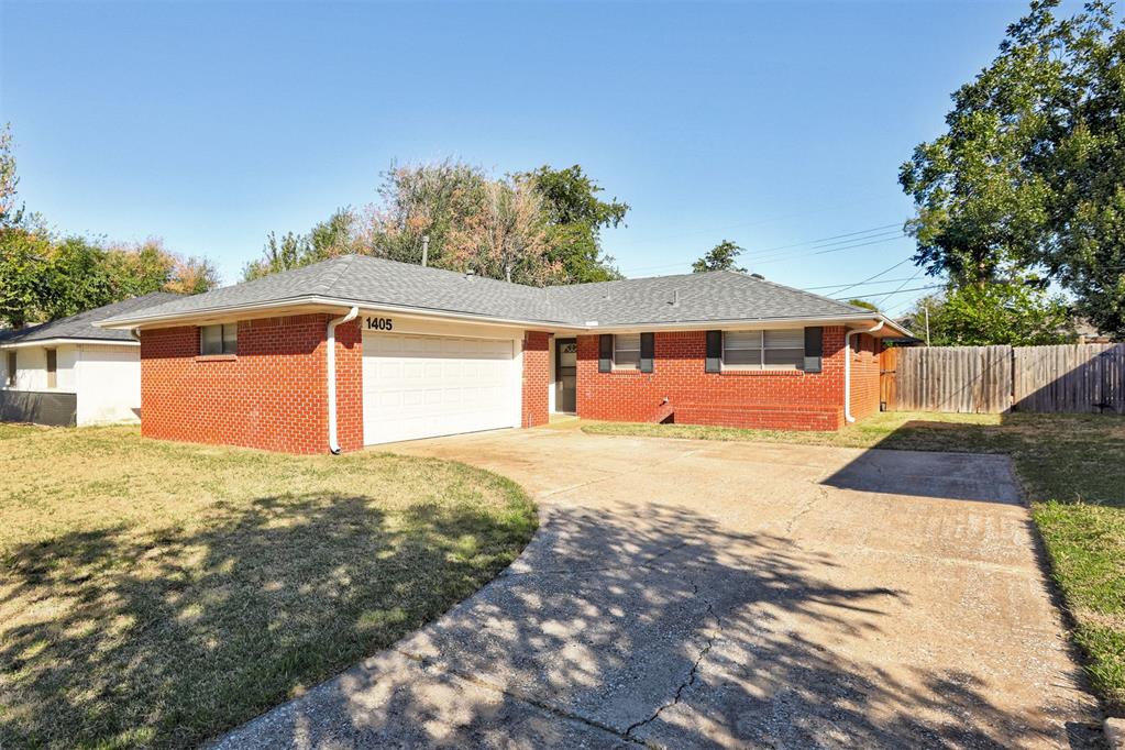 Welcome home to this well-maintained 2-bedroom, 1.5-bath brick ranch with a dedicated office and attached 2-car garage! This charming home offers a comfortable and functional layout with several valuable improvements, including a new roof and an updated central heating and cooling system with overhead ductwork replacing the original floor vents. Inside, you'll find a spacious living room that opens to the kitchen through a convenient breakfast bar, granite countertops, a separate dining area, and a generously sized laundry and utility room with plenty of additional space. The primary bedroom features its own private half bath, while the versatile bonus room makes a great home office, hobby room, or additional flex space with direct access to the back patio. Outside, enjoy a large fenced backyard, plenty of driveway parking, and the timeless appeal of a classic brick exterior. With its great layout, thoughtful updates, and inviting living spaces, this home is a great opportunity for homeowners and investors alike. Schedule your showing today!