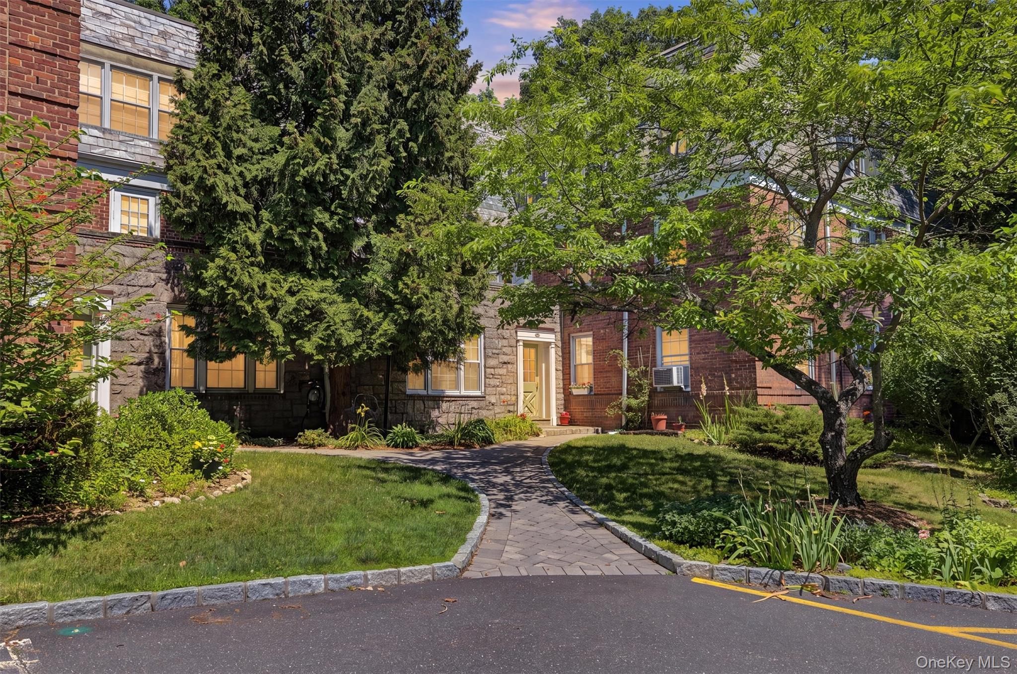 Absolutely stunning, sun filled top floor 1 Bedroom with private balcony facing the woods!  Enjoy all that this charming complex has to offer and if you are looking for a truly move in home - this is it!  Large entry Foyer, incredibly bright Living Room, formal Dining Room, updated Kitchen, spacious Bedroom, hardwood floors and amazing outdoor space!Laundry in walk out basement and tons of parking - all only 1.3 miles to Hartsdale train.  The complex has a playground, parks and BBQ area.  Waitlist for garage.  Cats are allowed