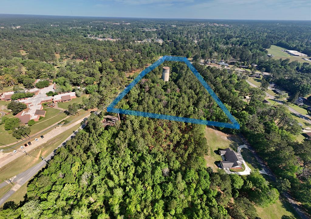 Exceptional development and investment opportunity on South Pinetree Blvd in Thomasville. This 9-acre tract is strategically located directly across from the dog park and near Thomas University, with convenient access to downtown Thomasville, shopping, dining, and about 40 minutes away from Tallahassee Fl.  The property offers strong potential for residential development, mixed-use projects, commercial expansion, office space, or other income-producing ventures, subject to zoning and buyer due diligence. Its prime location near the university and established community amenities makes it especially appealing for developers seeking long-term growth and high-visibility opportunities. Seller is open to adding acreage, negotiating the sale of approximately 12 acres (see MLS 928715), offering flexibility for a range of project scopes and investment strategies. Rare opportunity to secure a sizable tract in one of Thomasville's most accessible and desirable growth corridors.