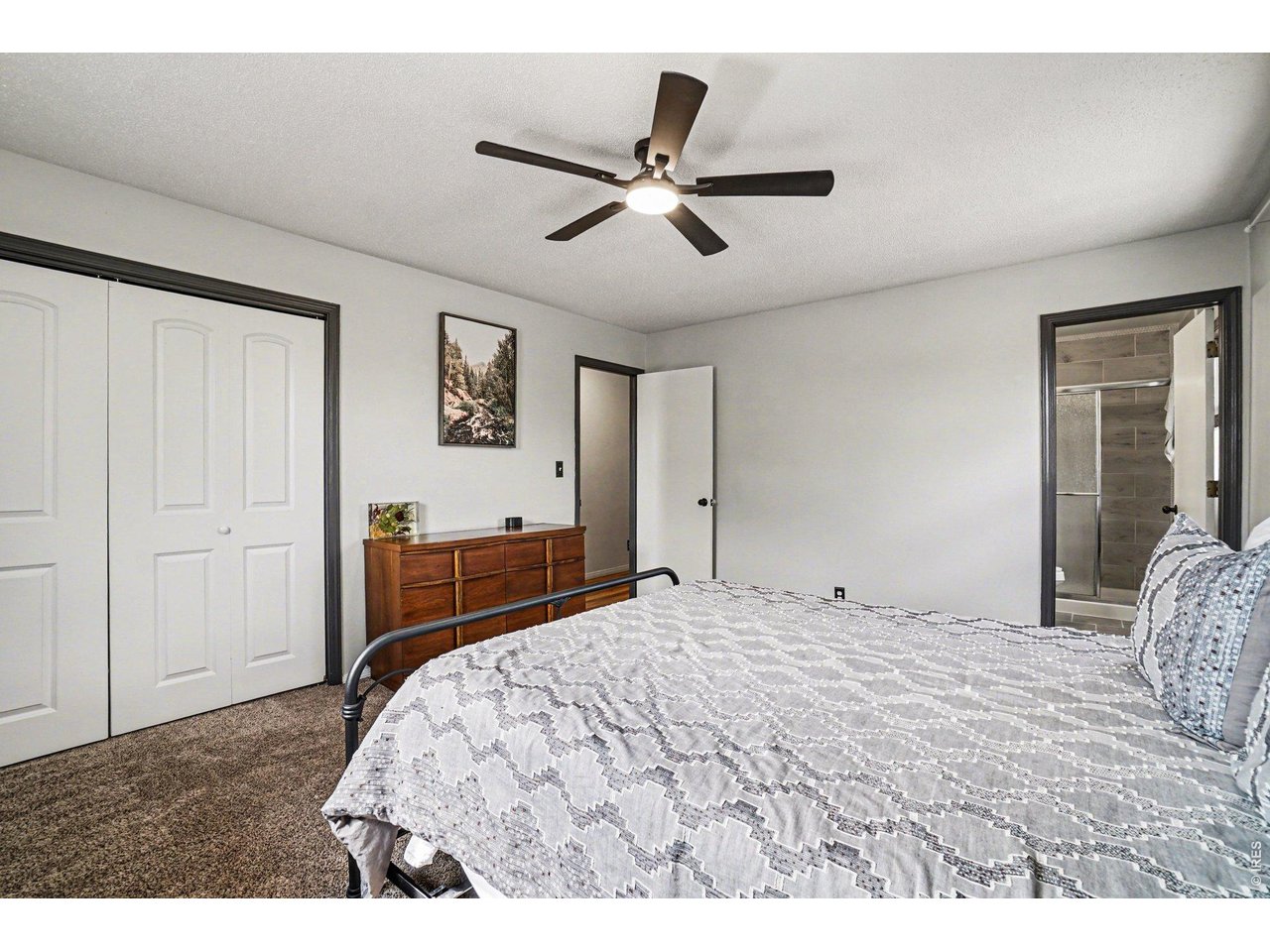 Discover your ideal home in Loveland, Colorado! This stunning 4-bedroom, 3-bathroom residence offers modern updates and no HOA restrictions. Enjoy a bright open-concept layout with a spacious living area with new vinyl flooring flowing into a chef's kitchen featuring a large island, stainless steel appliances including a new fridge and microwave, fresh interior paint, newly refinished cabinets, and contemporary lighting throughout. Recent upgrades include new AC, new water main line, new gutters, new window flashing, and a brand-new deck perfect for outdoor entertaining. The large fenced backyard is a private retreat with mature trees and beautiful landscaping-ideal for pets, play, or relaxation. The 2-car garage boasts stained and sealed concrete flooring, winterized for easy Colorado maintenance. With four generous bedrooms and three full baths, this turnkey home combines comfort and style. Located in family-friendly Loveland near top schools, trails, Boyd Lake, and vibrant downtown. Don't miss this rare no-HOA gem packed with fresh updates-schedule your tour today!