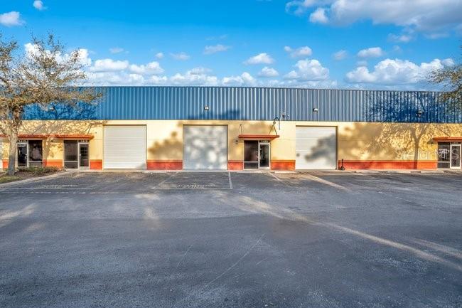 Here is your chance to own this versatile flex space, strategically located with easy access to I-4, US Highway 17-92, SR 434, SR 436, Maitland Avenue and Maitland Boulevard. This flex space warehouse consists of office entry space - this space comes fully furnished if buyers want items to remain. An upstairs office space which measures 10x17, a storage space which measures 6x4, The main bay with automatic roll up door and ceiling height of 22-24 feet and measures over 800 sq ft. This move-in space also includes 1 full bath, kitchenette, washer and dryer and separate sink space. The seller has also refinished all the cement floors in a protective coating. This space is ideal for a variety of operations from manufacturing to distribution. Its strategic positioning streamlines logistics and enhances connectivity for clients and suppliers alike, setting the stage for seamless operations and business growth.