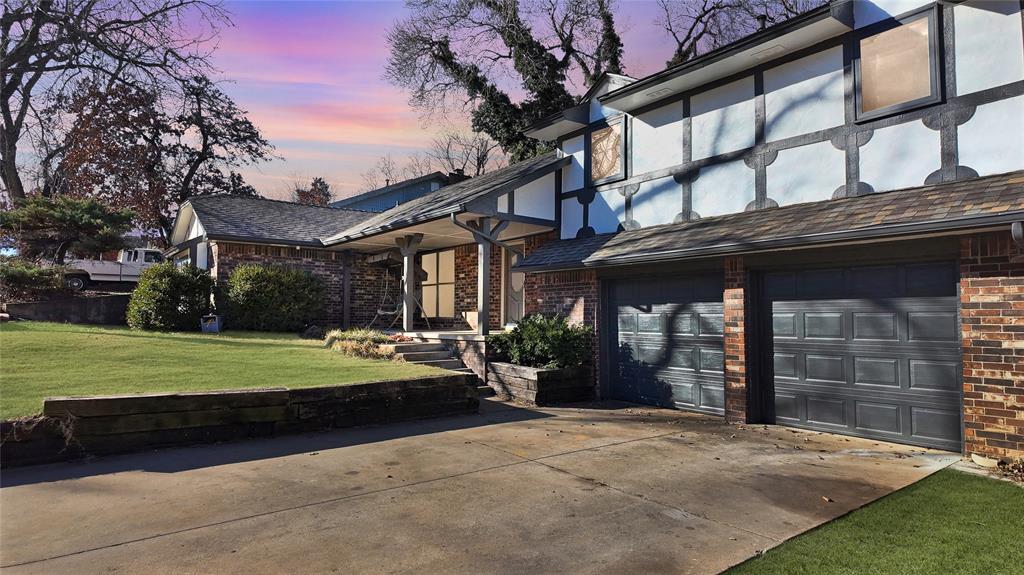 This one checks so many boxes! 2 living rooms, 2 dining areas, 5 beds 3.5 baths, a huge backyard that backs up to a walking trail, quiet cul-de-sac and so much more!The flow of this entry to living to breakfast area and kitchen make this home feel incredible. Each area has its own well defined space but you still get that open feeling so many people want. This split level home also has a split floor plan so the primary suite is on one side of the home, on the other side of the house upstairs are 3 bedrooms and a full bath with a tub, and downstairs is another living area, bedroom and a full bathroom with a shower. The downstairs area has it's own exterior entrance from the side of the home as well as its own HVAC system.Lots of fresh paint and flooring throughout the home. Brand new carpet in 2 of the upstairs bedrooms. The exterior paint was recently updated. There's also a newly installed fence throughout the back yard. Note, the 2 car garage was previously converted to become the downstairs living and bedroom. There is still a nice sized storage area behind the garage doors though. Ask your agent for info about the SQFT inside the realtor remarks and the uploads.