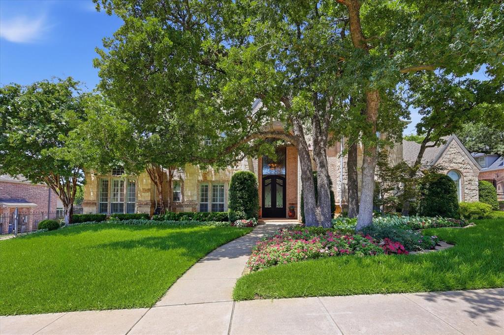 Situated on a .596-acre lot in Keller's Wildwood subdivision and zoned to Keller ISD, this 6,112-square-foot home offers 5 bedrooms, 5 bathrooms, 3 fireplaces, a dedicated office, media room, game room, sauna, downstairs primary suite, and a separate secondary bedroom on the main level.Designed for entertaining, the kitchen features dual islands, a 60-inch Wolf range, dual ovens, a 36-inch Sub-Zero refrigerator and freezer, dual Bosch dishwashers, warming drawers, and a Wolf steam oven. Refinished hardwood floors, crown molding, tray ceilings, plantation shutters, surround sound, electric shades, and upgraded sliding doors enhance the main living areas.The downstairs primary suite includes backyard access, a cedar-lined closet, and a bath with jetted tub. A separate first-floor bedroom and full bath provide flexibility for guests, multi-generational living, or live-in support. A dedicated office with built-in cabinetry and a utility room with sink, refrigerator, linen storage, and extensive cabinetry provide additional functionality. **Pictures being taken July 21st!!Upstairs, the game room features a full bar with kegerator, sink, built-in cabinetry, televisions, and access to a covered balcony completed in 2024. The adjacent media room includes a projector, screen, surround sound, and seating.Outdoor amenities include a heated saltwater pool, waterfall feature, negative-edge spa, sauna installed in 2025, putting green, outdoor fireplace, and multiple covered entertaining areas. The outdoor kitchen is equipped with a Viking grill, Big Green Egg, griddle, warming drawers, refrigerator, sink, granite countertops, heaters, and misting system.Additional features include dual staircases, whole-home water filtration, reverse osmosis system, and numerous updates throughout. Conveniently located near shopping, dining, and major commuter routes.