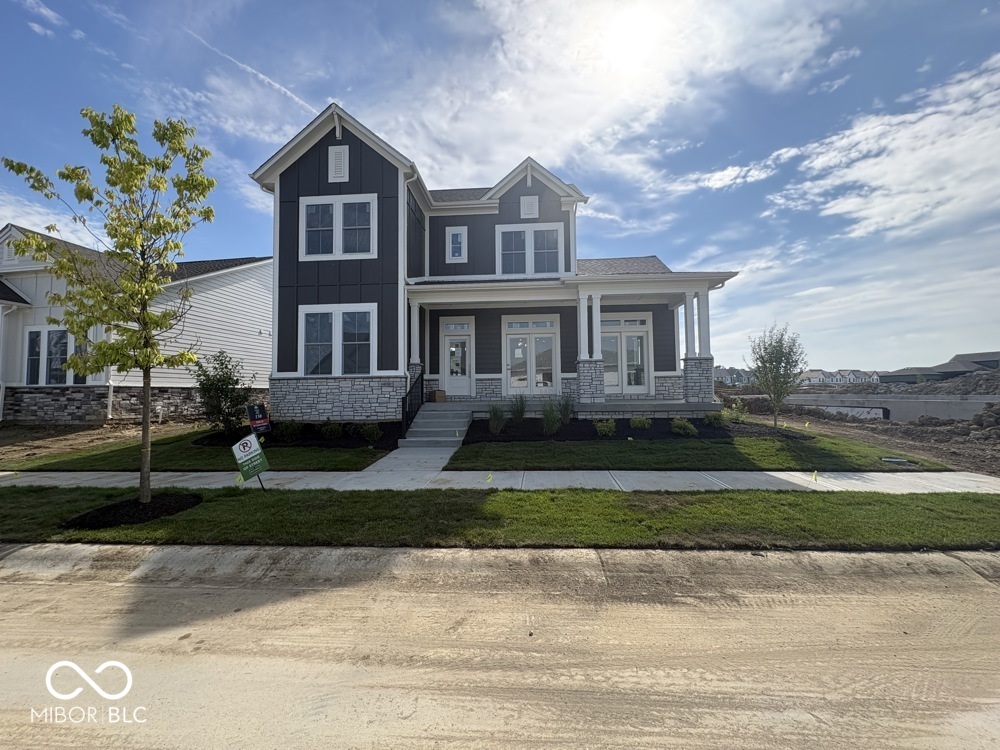 Discover exceptional living in the highly sought-after Wild Air community of Zionsville. The beautifully crafted Independence floor plan by David Weekley Homes showcases thoughtful architecture, innovative design, and high-quality craftsmanship.  Sunlit living and dining spaces flow seamlessly into a designer kitchen, creating a warm and inviting heart of the home, designed for both everyday convenience and effortless entertaining. A luxurious experience awaits in the private, main floor owner's retreat, complete with a spa-inspired bath and dual walk-in closets. Enjoy unlimited potential for additional living or guest space in the expansive finished basement and second floor retreat, featuring carefully curated finishes and providing the perfect balance of comfort and style for today's homeowners.  Beyond your front door, Wild Air offers an unmatched lifestyle centered around nature and community. Amenities include trails, clubhouse, pool, and fitness center. With nearby shopping, dining, and entertainment-and access to top-rated Zionsville Community Schools-this location delivers both convenience and prestige.
