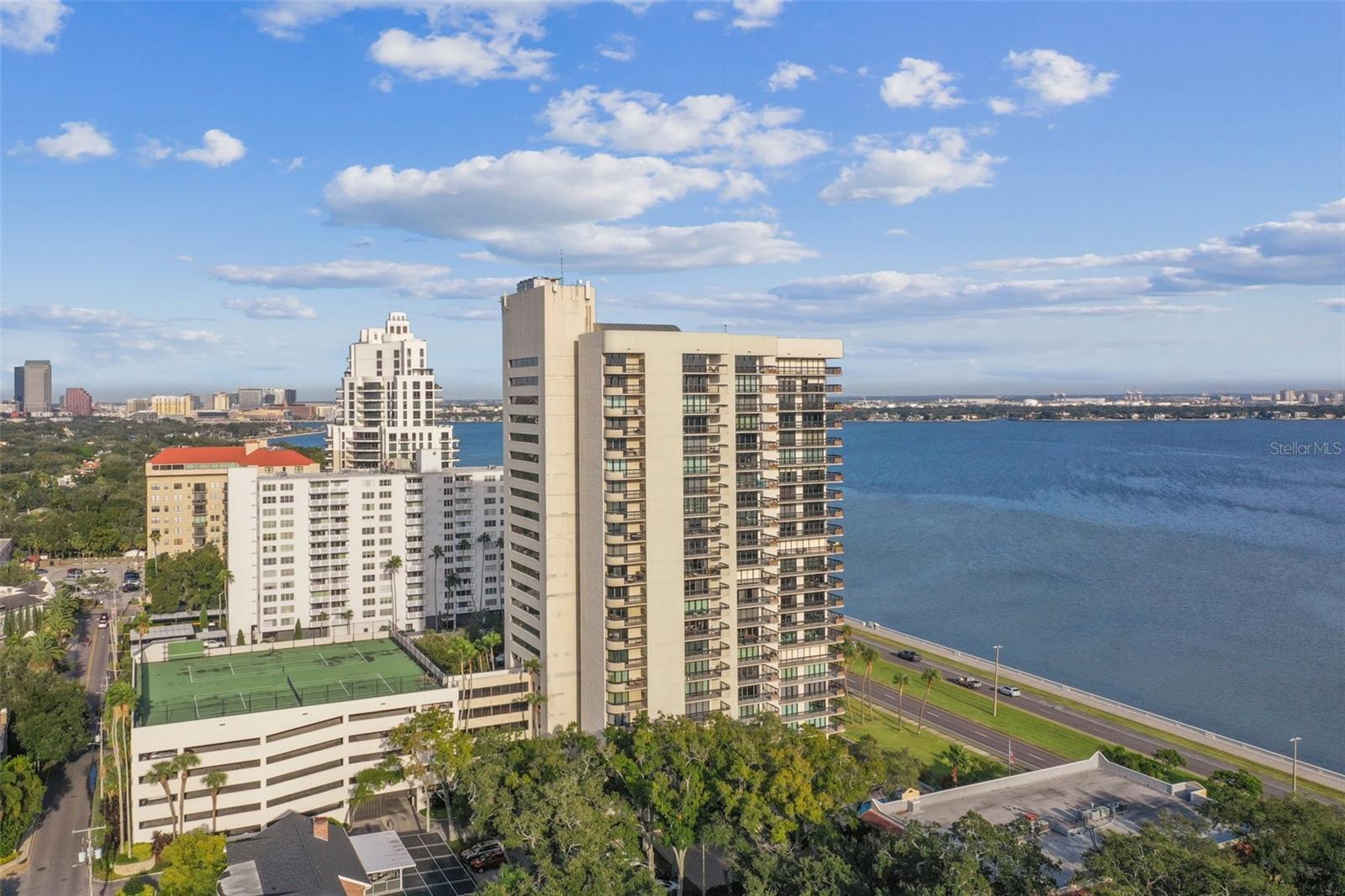 Under contract-accepting backup offers. Experience elevated Bayshore living at The Atrium on Bayshore - one of Tampa’s most recognizable waterfront addresses. Priced exceptionally well, this 2-bedroom, 2-bathroom condo offers sweeping views of Tampa Bay, where sunrises over the water and front-row Gasparilla parade views become part of everyday life. Ideally positioned on the second floor near the elevator, the layout is both functional and private, with a spacious primary suite featuring an ensuite bath and a split-bedroom floor plan perfect for guests or a home office.The open kitchen and living area create an easy flow for entertaining and relaxed daily living, while oversized windows and balcony access bring in natural light and showcase the bay views. The unit also includes one assigned parking space conveniently located on the same floor as the condo.Residents of The Atrium enjoy resort-style amenities including 24-hour security, a fitness center, tennis courts, club room, sparkling pool area, and secure parking garage. From the lush tropical atrium that welcomes you and your guests to the unbeatable Bayshore location, this is a rare opportunity to enjoy luxury living at an incredible value.