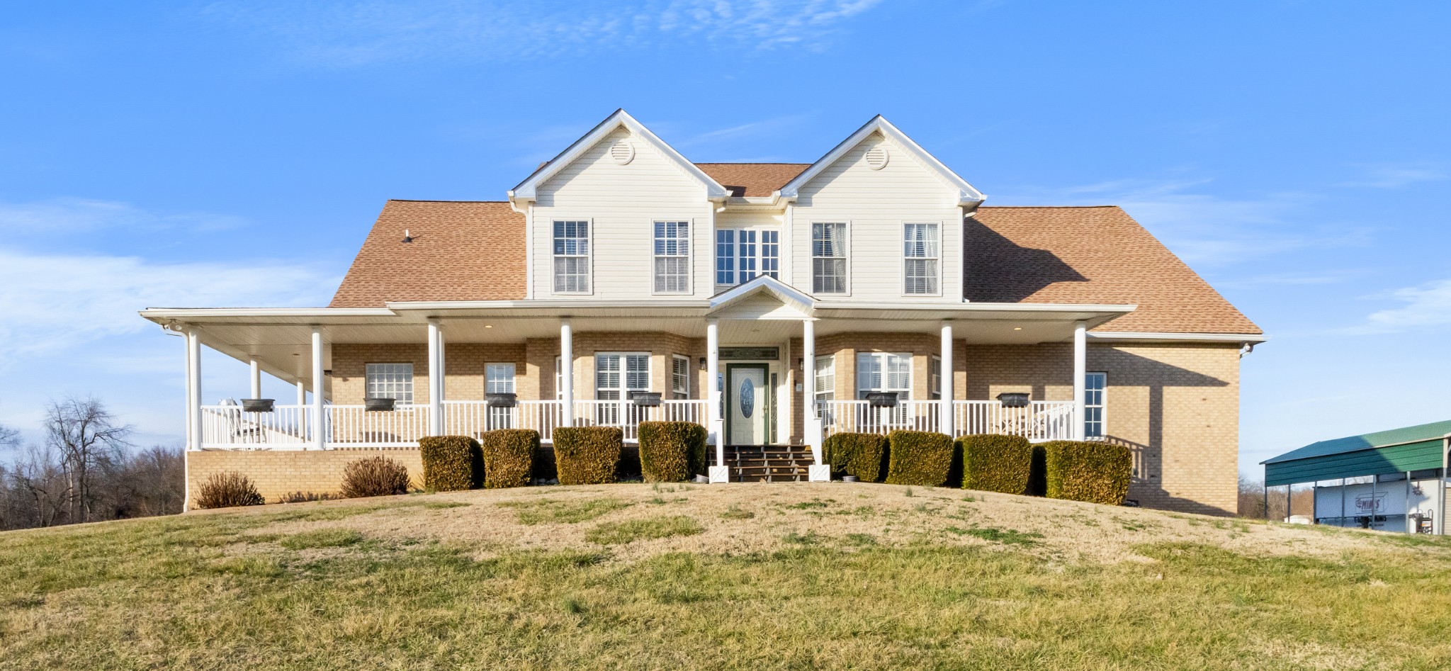 $50,000 Concessions for buyer upgrades!!  Picturesque 30+ Acre Estate in Adams, TN – A Rare Countryside Retreat!  Set on 30+ breathtaking acres, this three-story estate in Adams, TN is perfect for equestrians, outdoor enthusiasts, and those seeking a private escape.  The two-story great room boasts floor-to-ceiling windows, offering stunning panoramic views. A dedicated office with French doors adds elegance, while the main-level owner’s suite features a fireplace and spa-like bath. Upstairs offers oversized bedroom suites and a spacious entertainment room, while the walkout basement provides a large multi-purpose space with a wood-burning fireplace.  Outside, a wraparound porch overlooks the two serene ponds, one of which is fully stocked with bass and catfish. The flat, usable acreage is ideal for horses, farming, or outdoor recreation, and the property offers abundant wildlife, making it a prime location for hunting. A large barn with a connected concrete shop completes this incredible property.  This rare opportunity blends luxury, space, and natural beauty. Schedule your private tour today!