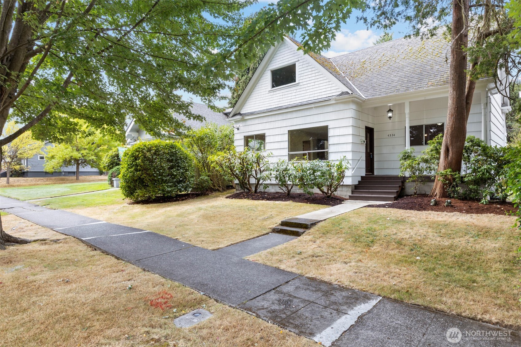 So much potential with this Centrally located Tacoma Home that's ready for you to make it shine again. Charming 1903 Tacoma home offering 1,552 sq ft of opportunity in a cute tree-lined neighborhood with great streetscape! This 3-bedroom home features one on the main, 2 more and an additional finished room upstairs, plus a full bath on the main floor and an unfinished/partially finished upstairs bath area with a tub and sink. While the home is ready for updating, it offers the flexibility to live in it while making improvements over time—or bring your vision and transform it into something special. The spacious backyard is a standout, with plenty of room for gardening, entertaining, play, or potentially adding a detached garage, shop or possible ADU. Conveniently located just minutes from mall shopping, freeway access, and everyday amenities. A great opportunity for a buyer looking for character, space, and potential in Tacoma! Being sold As-is. May qualify for Rehab Loan. New front porch boards/railing. Newer exterior paint and roof within the last few years.