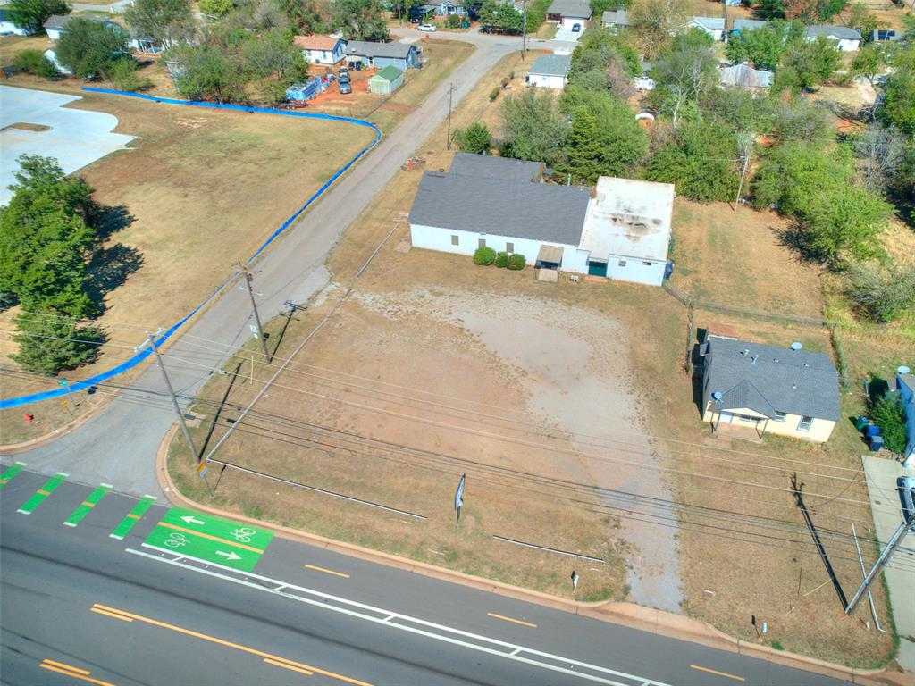 Great opportunity with two residentially zoned city lots and an existing building previously used as a church! Conveniently located near highways and Tinker Air Force Base. Purchase this property on its own or as a package with MLS #1253011 as a package for $120,000, which includes the house just to the east. Bring your ideas! Potential uses for the existing building or future residential construction (subject to city approval). Buyer to verify zoning, permitted uses, and building requirements.