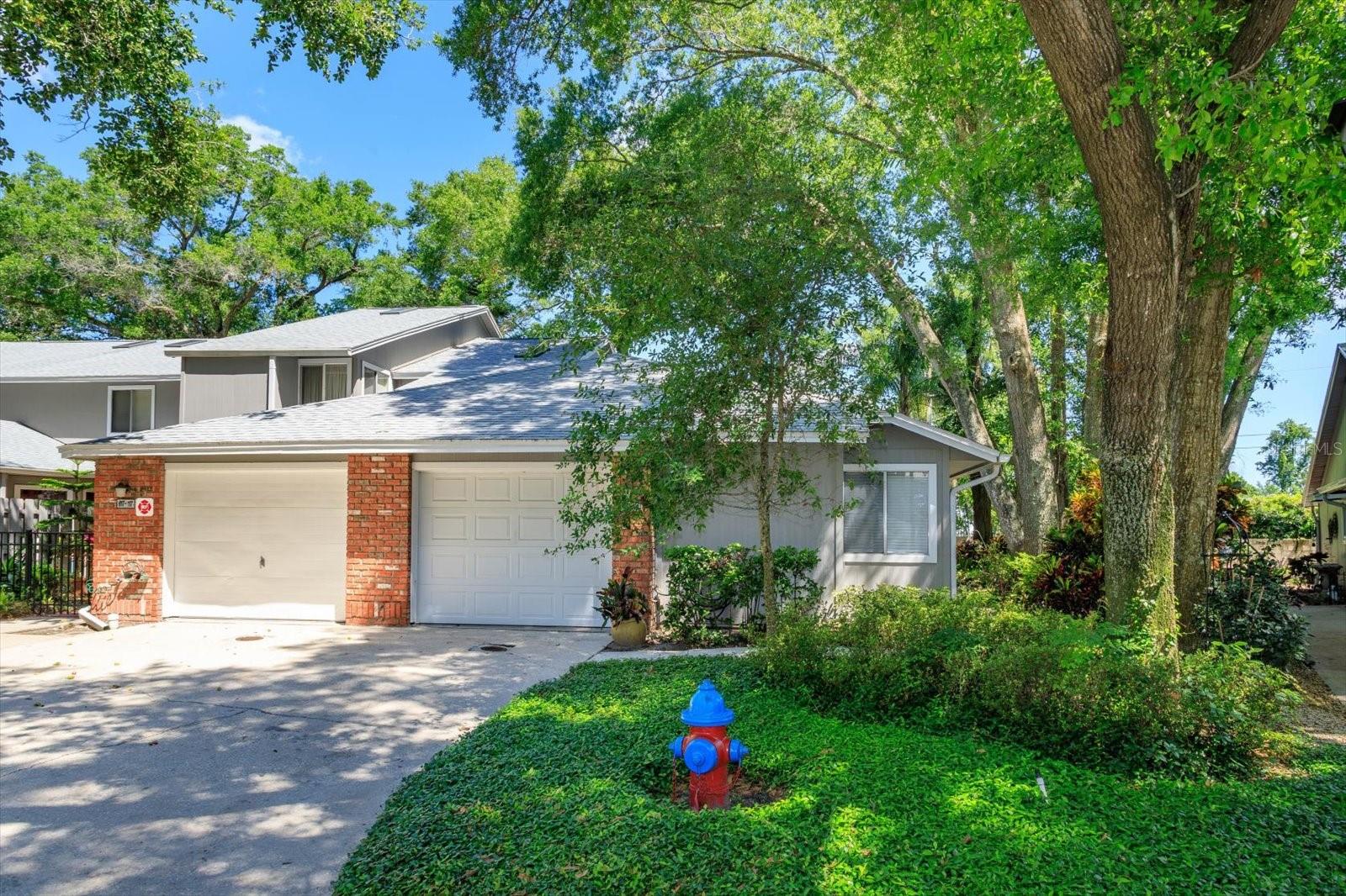 Lakeside Luxury Living in Altamonte Springs – Updated FIRST FLOOR - END UNIT - 2BR/2BA Condo with Resort-Style Amenities. 

Welcome to your serene retreat in the heart of Altamonte Springs!  Located in a private, GATED LAKEFRONT COMMUNITY with tree lined streets, this beautifully updated 2-BEDROOM, 2-BATHROOM condo offers modern elegance, comfort, and an unbeatable lifestyle.  Step inside to discover an open, light-filled floor plan with soaring ceilings and skylights.  The completely renovated kitchen features brand-new cabinetry, luxurious quartz countertops, and stainless steel appliances—perfect for both everyday living and entertaining.  Throughout the home, LUXURY WOOD LAMINATE FLOORING is paired with LARGE MODERN TILE in the UPDATED BATHROOMS for a cohesive, contemporary look.  Enjoy added flexibility with a spacious BONUS ROOM—ideal for a home office, reading nook, creative space, or 3rd bedroom. Unwind year-round in the FULLY INSULATED FLORIDA ROOM overlooking a lush, private green space.  The brick patio is your own peaceful oasis, surrounded by mature trees and tropical landscaping.  The spacious primary suite offers a spa-like ensuite bath with a dual-sink vanity, oversized walk-in shower, and a large walk-in closet.  The split-bedroom layout enhances privacy, and the home is tastefully finished in calming, neutral tones with ceiling fans throughout and ample storage.  For the hobbyist or those needing extra storage, the ATTACHED GARAGE features extensive shelving to keep everything organized along with your very own dedicated WORKSHOP space.
 Major upgrades include:
NEW HVAC (2024);
UPDATED PLUMBING and ELECTRICAL;
NEW ROOF;  EXTERIOR PAINT & GUTTERS.

Resort-Style AMENITIES Include:
• 2 sparkling SWIMMING POOLS
• CLUBHOUSE with kitchen/bar, GAME ROOMS - BILLIARDS, PING PONG, GAME TABLES, Special Events & regular weekly Activities to participate at your leisure
• FITNESS CENTER and Pickleball, Tennis and Basketball COURTS for day or night play
• BBQ area and expansive lawn for gatherings & enjoying the 4th of July fireworks of Cranes Roost Park
• Private COVERED DOCK, BOAT PARKING, WATER SPORT RACK STORAGE and access to Lake Orienta
• PET-FRIENDLY (no breed or weight restrictions)
• HOA includes HIGH-SPEED INTERNET AND PREMIUM CABLE TV.  

Prime Central Florida Location:
Minutes from shopping, dining, hospitals, airports, and public transit.  Just 15 minutes to Downtown Orlando and 45 minutes to the beaches!  

Don’t miss your chance to own this move-in-ready gem in a vibrant, amenity-rich community. Schedule your private showing today and experience lakeside living at its best!