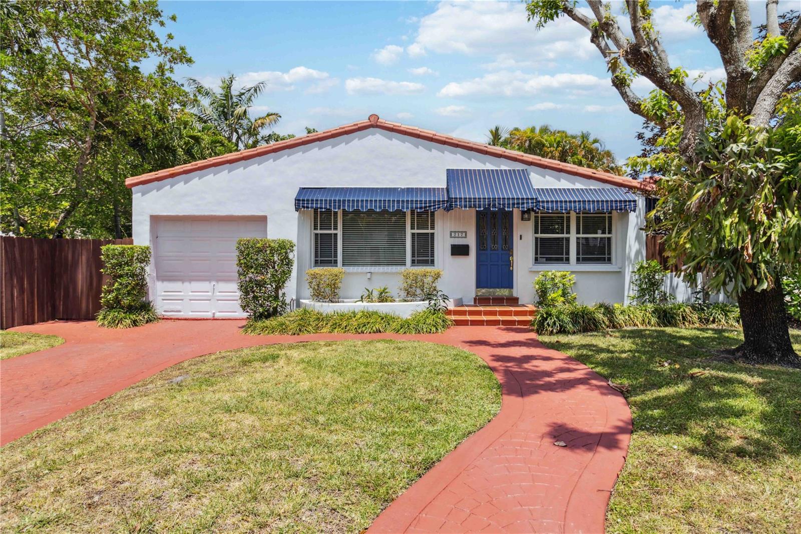 Located in one of Miami’s most sought-after gated communities where the HOA is optional, this charming 1936 home in Belle Meade offers the perfect blend of historic character, modern updates, and long-term investment potential. With 3 bedrooms, 2 updated bathrooms, and 1,541 square feet of living space, this property is fully leased through February 2026, providing immediate rental income in a stable, appreciating market.

Inside, the home features refinished wood flooring throughout, a renovated kitchen with modern appliances, and updated bathrooms—ensuring low maintenance and tenant satisfaction. The 2020 AC unit adds efficiency, while awnings and a fully fenced yard help minimize expenses and offer additional peace of mind. Tenants enjoy indoor-outdoor living with a private patio, side deck, and fruit-bearing trees including mango, avocado, and sapodilla.

Set apart from the bustle of Biscayne Boulevard, yet minutes from all the action, Belle Meade is known for its security, charm, and high demand. The property is also located near parks and award-winning schools, adding to its long-term rental appeal. Whether expanding your portfolio or securing a piece of historic Miami real estate, this move-in ready home checks all the boxes.