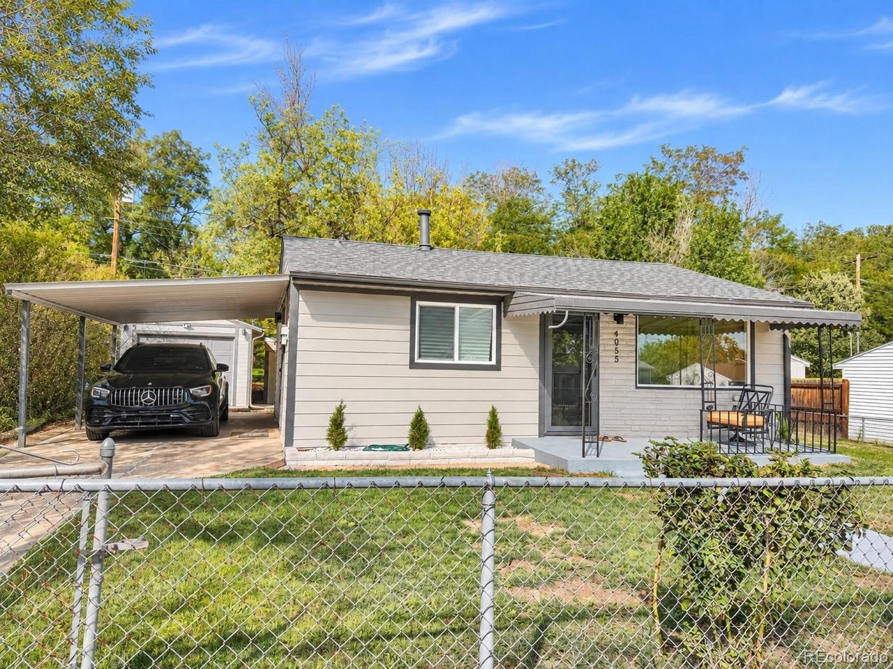 Welcome to this beautifully updated 2026 remodel, thoughtfully designed with high-end finishes, quality materials, and modern functionality throughout. Featuring a bright, open floor plan and beautiful hardwood floors throughout the main living areas, this home blends everyday comfort with substantial recent upgrades. Key Features & Upgrades Kitchen: Remodeled in 2026 with brand-new, top-of-the-line stainless steel appliances, anchored by a premium Thermador refrigerator. Beautiful Hardwood Floors: Classic hardwood flooring . Luxury Bathroom: Updated with sleek black marble tiling  and modern finishes. Natural Light: Three newly installed solar tube skylights bring additional natural light into the home, creating a brighter and more inviting interior. Exterior Upgrades: New Hardie Board siding provides a clean, updated appearance along with long-lasting durability and low maintenance. (Very hail resistant!) New Windows & Entry Door: New double-pane windows improve comfort and energy efficiency throughout the home, while a new Andersen front door adds quality, security, and curb appeal. Upgraded Utilities: Features a brand-new tankless water heater for improved energy efficiency and continuous hot water. Flexible Living Space: Includes two comfortable bedrooms, a featured primary bedroom, an open living area, and a functional layout designed for both everyday living and entertaining. Outdoor Spaces: Low-maintenance front landscaping is paired with a backyard sprinkler system, creating an easy-to-maintain outdoor space ideal for gatherings, pets, or relaxing. Parking & Storage: Includes an attached carport, outdoor storage shed, and plenty of additional off-street driveway parking. Detached Garage: A spacious two-car detached garage offers generous additional room for a workshop, studio, home gym, craft space, or extra storage.