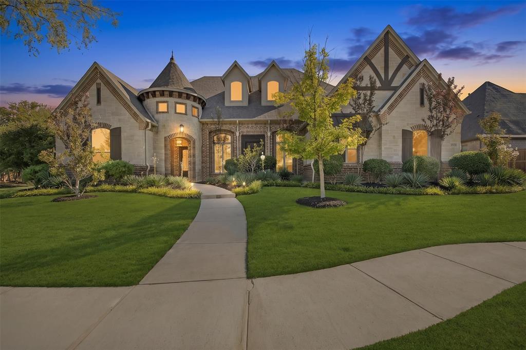 A rare offering in the highly sought-after Lakes Addition, this beautifully refreshed East Keller residence offers 4,820 square feet of sophisticated living with an exceptional floorplan and beautifully appointed interiors. Fresh interior paint, designer lighting, soaring ceilings, and architectural details are found throughout, while the location provides convenient access to Southlake Town Square, Sky Creek Ranch Golf Club, parks, dining, and shopping. Dramatic ceiling heights and abundant natural light create an impressive sense of scale. The floorplan places three of the home’s four bedrooms on the main level, including the primary suite and secondary accommodations. The primary suite features elegant ceiling details and a spa-inspired bath with dual vanities, soaking tub, expansive shower, and walk-in closet with custom built-ins. The chef’s kitchen anchors the main living spaces with an oversized island, gas cooktop, double ovens, abundant cabinetry, and statement lighting. The adjoining living room features soaring ceilings and a fireplace. Upstairs, a spacious landing opens to a dedicated media room and private fourth bedroom with full bath. An expansive covered patio with outdoor kitchen and entertaining areas overlooks the custom pool and heated spa. Alongside the property, a neighborhood pond and fountain provide a beautiful backdrop, with the soft sound of moving water adding tranquility to the outdoor setting. This distinctive residence presents a rare opportunity.