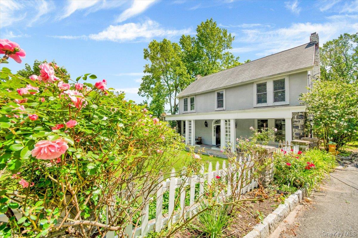 Looking for a tranquil oasis to escape the hustle bustle?....look no further!  Nestled high in a serene woodland setting this property offers it all...the calm of country living yet only minutes away from all the modern conveniences that the beautiful hamlet of Hartsdale has to offer.  Only a 5 minute car ride to Hartsdale Metro North providing a 45 minute direct train ride into NYC.  Sitting on just over 30,000 sq ft of land (0.7 acres) in a small private cul de sac, this 4 level, 4200 sq ft property boasts 6 bedrooms, 3 full bathrooms and a 1st level powder room.  It has been beautifully renovated while still maintaining its old world charm with lovingly restored features such as original hardwood double doors and flooring.  The entrance level offers a beautiful foyer and 2 reception rooms both with stunning functional fireplaces, a fully renovated kitchen with large island, complete with all modern appliances.  From the kitchen you can access the sun drenched deck offering a birds eye view of the river and surrounding woodland area, where you can sit and watch the roaming deer in their natural habitat.   The 2nd level offers an en-suite master bedroom with spacious walk in closet and bathroom featuring a large walk-in shower and soaking tub.  This 2nd level offers a further 2 bedrooms, full hall bath and convenient 2nd floor laundry  The 3rd level provides a further 2 sun drenched bedrooms and full hall bathroom.  The finished basement offers more functional living space, currently being used as a home office and further guest bedroom, complete with full bathroom .  Access is given here to the lower level backyard.  The detached 2 car garage has a finished 2nd level loft area, ideal for playroom or artist studio.   If looking for a tranquil relaxing place to call home but still require convenient access to shops, stores and transportation this property ticks all the boxes!