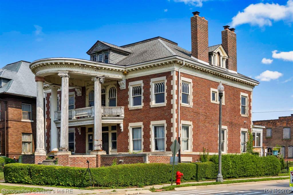 The Joseph F. Weber House is a hip-roofed, Colonial Revival-style. Neo-Georgian-inspired, 3 story, symmetrically-shaped red brick and grey stone trimmed structure, featuring two-story semi circular Ionic columned and dented portico which dominates the front facade. The brick water table, side facades and window surrounds are accented with limestone quoining. This home has historical significance of a turn of the century Detroit lumberman and real estate speculator. Joseph F. Weber: 1845 to 1935, began his career in 1863 selling cordwood to steam boats on the Detroit River. He opened a lumberyard and mill in Downtown Detroit in 1870, and later relocated his business to the edge of city limits.  The building permit for the Weber House was issued on October 25, 1901 and the present wood columned, stone and limestone residence was completed in April 1903.  Step into a piece of Detroit's history with this extraordinary turn-of-the-century residence, a rare opportunity for visionary buyers. This property is poised for a transformative revival into the 21st century. Whether you envision a magnificent single-family home or a dynamic mixed-use development, the potential is limited only by your imagination. Located in the heart of the historic Brush Park community, this is a chance to shape the future of one of Detroit's most coveted neighborhoods. This is an exclusive opportunity for serious parties ready to create a new legacy.