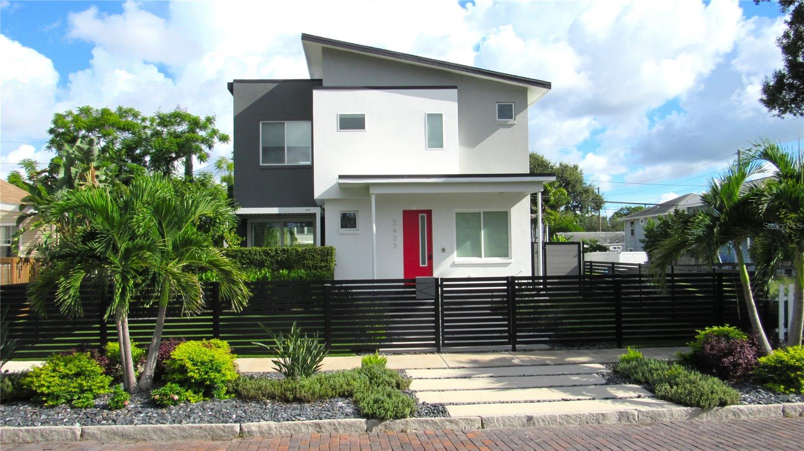 Virtually every aspect of this exceptional 2018 Kenwood residence has been renovated and enhanced to look and feel like a 2026 home. Combining contemporary design, modern technology, and beautifully reimagined indoor and outdoor living, this property is a true modern showplace. Major upgrades include complete interior and exterior repainting; new flooring throughout; new electronically controlled, remote-operated window shades; new kitchen countertops and backsplash; replacement of all electrical receptacles with the latest modern designs; new LED lighting throughout the home; complete relandscaping of the entire property from scratch; a new travertine pool deck; whole-property underground drip irrigation; new exterior landscape lighting; designer custom fencing enclosing the entire property; a new Kohler whole-house generator system; a fully owned and paid-for solar power system; a custom two-part epoxy garage floor; a new climate-controlled garage heating and air-conditioning system; a custom, remotely controlled and illuminated pergola; and a new custom storage shed.Offering 4 bedrooms, 3 bathrooms, and approximately 2,315 square feet, this beautifully upgraded home showcases a striking modern aesthetic, sophisticated finishes, and inviting living spaces. The refreshed kitchen, contemporary lighting, new flooring, and carefully selected improvements create a cohesive, move-in-ready environment designed for comfort, functionality, and entertaining.The outdoor experience is equally impressive, with the completely redesigned landscape creating a fresh, cohesive setting for the pool and spa. The travertine pool deck, custom fencing, landscape lighting, and illuminated, remote-controlled pergola combine to create an inviting private retreat for relaxation and entertaining.Beyond its extensive cosmetic and landscape improvements, the home features an advanced $100,000 Savant home automation system. Control every light, fan, and window shade from your phone, along with the heated pool and spa. An integrated audio system and upgraded HVAC equipment further enhance comfort and convenience.Located in the desirable Kenwood neighborhood of St. Petersburg, this distinctive residence is just two blocks from the restaurants and shops of Central Avenue, nine blocks from downtown St. Petersburg, and approximately a 10-minute walk from Tropicana Field, home of the Tampa Bay Rays. Don't miss this opportunity to own an ultra-modern masterpiece in one of St. Petersburg's most desirable areas.