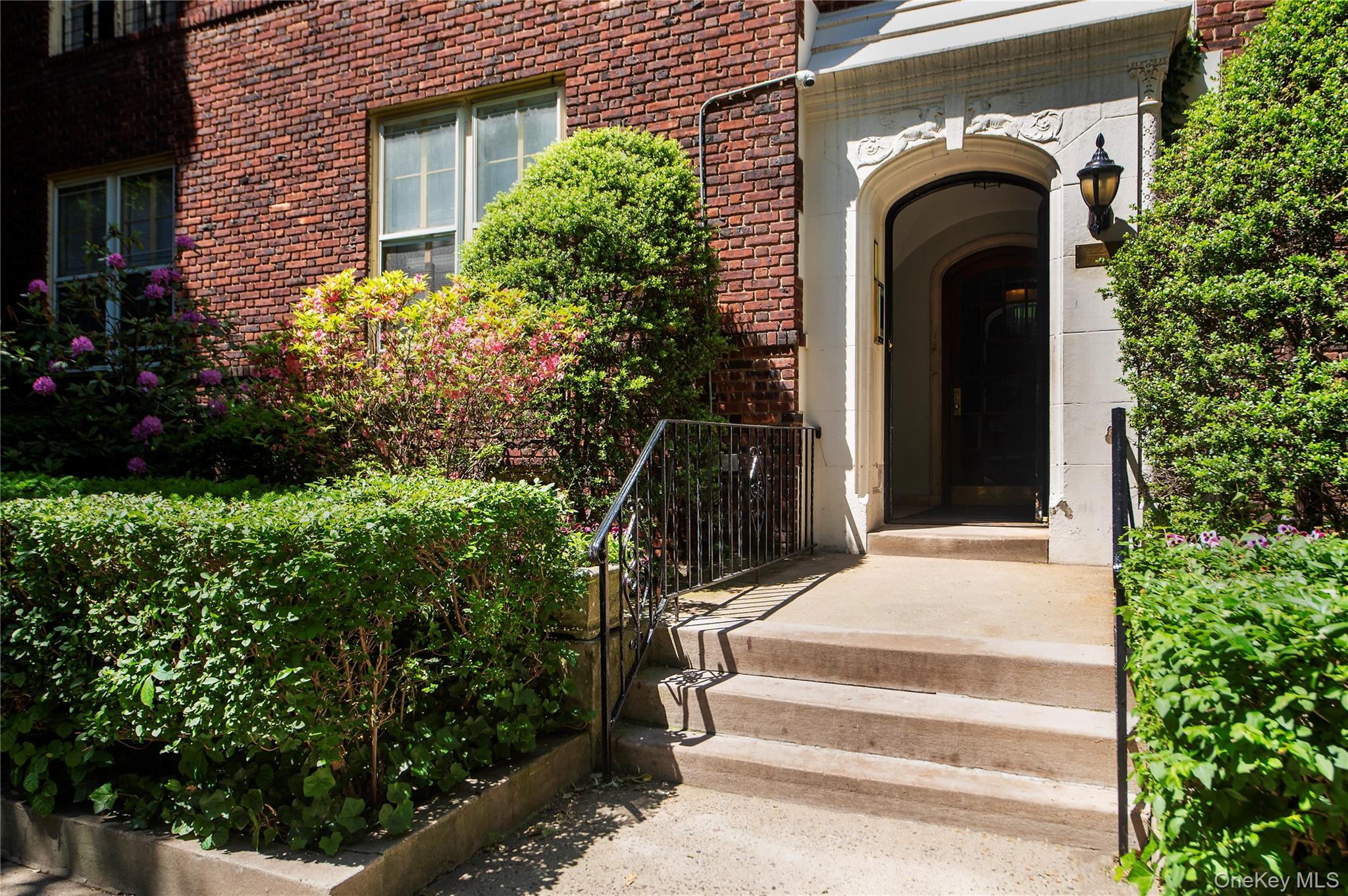 Majestic 3BR/2BA Pre-War Landmark with Private Garden Views at The ChateauWelcome to The Chateau, one of the most elegant, French Renaissance-inspired cooperatives in the historic heart of Jackson Heights. Perched on the 4th floor, this meticulously restored 6-room architectural masterpiece seamlessly blends the grandeur of 1920s French royalty with modern, open-concept living. Featuring four exposures (North, South, East, and West), this sun-drenched home is flooded with incredible natural light from sunrise to sunset.Step through the front door into pre-war heaven. An expansive, open-floorplan living and dining area greets you, anchored by a rare, functional wood-burning fireplace, soaring high ceilings, and pristine, newly restored plaster walls. Underfoot, the original oak parquet floors gleam, reflecting the massive windows that frame the space.For the design visionary, the property balances historic character with room to personalize. The layout offers three spacious bedrooms and two full bathrooms. The quiet primary suite boasts its own private full bath, abundant closet space, and serene western views over the cooperative's award-winning private gardens. The second and third bedrooms are cleverly divided by a classic Jack-and-Jill bathroom. Both bathrooms showcase beautiful, original vintage vitreous China bathtubs and historic fixtures. A charming, 1950s "Kitch-style" kitchen completes this classic layout.Designed in 1923 by pioneering architect Andrew J. Thomas, The Chateau is a landmarked community renowned for having one of the most spectacular, block-long private interior gardens in New York City. This magnificent home offers unparalleled tranquility just steps from express transit, world-class dining, schools, and shopping. Bring your vision to this blank canvas and own a piece of NYC history.