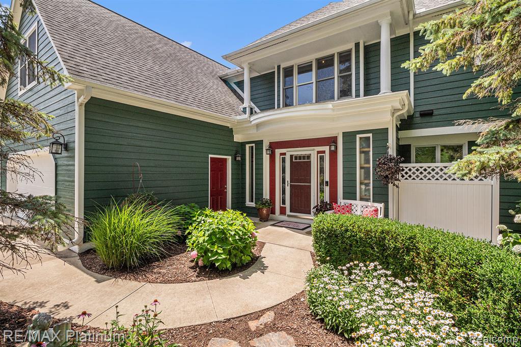There's Always Room for Everyone at "Sunset Shore"! With over 4,300 square feet of beautifully designed living space, this impressive lakefront home on the eastern shoreline of Lobdell Lake provides the very best in lakeside living. Whether you're hosting family gatherings or simply soaking in the peaceful surroundings, “Sunset Shore” delivers space, comfort, and breathtaking views at every turn. Spectacular views await from every angle—whether you’re inside looking through walls of windows on both levels, relaxing on your expansive Trex deck, or enjoying the paver patio surrounding the raised lakeside firepit. Prefer some shade? Engage your remote-controlled Marygrove awning, complete with integrated lighting and a dropdown sun screen for those perfect summer afternoons. Inside, the chef’s kitchen is nothing short of incredible. Featuring premium LaFata cabinetry—a luxury you truly have to experience to appreciate, the space also includes a large serving island with a built-in salad prep sink and a convenient command center off to the side. This Home has two bedrooms on the entry level and three more upstairs, along with an incredible second-level great room boasting panoramic sunset lake views. Lobdell Lake connects to Bennett Lake and Hoisington Lake, giving you access to over 820 acres of navigable water. Explore nature’s best or boat over to one of the waterfront restaurants dotting these scenic shores. Retreat to your one-of-a-kind primary suite, complete with more beautiful lake views and a luxurious ensuite bath featuring a massive jetted tub—perfect for unwinding after a busy day on the lake. Other features include: Meticulously maintained condition, Abundant storage throughout, Oversized heated, drywalled and insulated garage and Located on a quiet cul-de-sac (plenty of space for parking). There’s so much more to experience more than words can capture. Come see "Sunset Shore" in person. Once you see it, you’ll believe it... and want to make it yours.