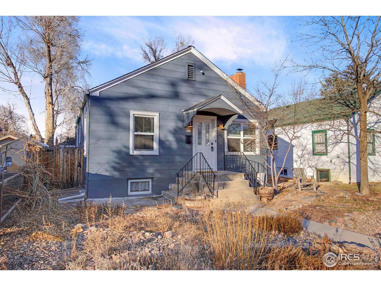 Kittle Real Estate presents this prime Old Town setting that puts the best of the city close by! This well-maintained home sits in the heart of Fort Collins, placing everyday conveniences, local flavor, and a vibrant atmosphere just moments away. The newly updated main level opens up into a bright, airy floorplan designed for easy living and entertaining, featuring refinished hardwood floors that run throughout. The spacious kitchen features stainless steel appliances and quartz countertops, offering plenty of room to cook and gather. Two bedrooms and a shared full bathroom with a convenient laundry chute complete the main level. Downstairs, the finished basement expands the living space with a generous entertainment area, an additional bedroom and bathroom, plus a dedicated laundry area and a separate utility room that's perfect for storage or organization. The fenced backyard feels like a private retreat, highlighted by a stamped concrete patio and overhead string lights that create the perfect setting for evenings outdoors. The one-car garage includes an EV hookup, while the alley access behind the garage opens up valuable additional space for RV or boat parking. Located just a short distance from CSU and only one mile from Old Town's restaurants and breweries, this home offers unmatched convenience and energy where dining, entertainment, and local favorites are always within easy reach. No HOA!