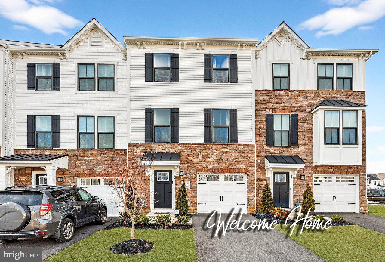 Welcome to 39 Sage Way, an exceptional townhome located in the coveted Laurel Point community of Mount Laurel, NJ. This highly desirable Mozart model masterfully combines the scale and comfort of a single-family home with the ease of low-maintenance townhome living.Offering approximately 2,000 square feet of thoughtfully designed living space, this 3-bedroom, 2.5-bath residence is filled with natural light and refined finishes throughout. The ground level welcomes you with a bright atrium-style entry accented by wide-plank flooring and a convenient half bath. A spacious finished lower level with a spacious closet for storage provides endless versatility—ideal for entertaining, a home office, guest bedroom or relaxing retreat—with direct access to the backyard through sliding glass doors.The main living level impresses with its expansive open-concept layout, soaring ceilings, and recessed lighting. At its center is a chef-inspired kitchen featuring a statement island with granite countertops, pristine white cabinetry, stainless steel appliances, and an oversized double-door pantry. The adjoining dining area flows effortlessly onto a private deck, creating the perfect backdrop for indoor-outdoor entertaining.Upstairs, the primary suite offers a serene escape, complete with a tray ceiling, walk-in closet, and spa-like ensuite bath with dual sinks and a luxurious  shower. Two additional bedrooms with generous closets, a stylish full bath, and conveniently located upper-level laundry complete this floor.Elegant, move-in ready, and ideally located, 39 Sage Way delivers a lifestyle of comfort, style, and sophistication. Showings begin Saturday, 1/10/2026, at the Open House—this is one you won’t want to miss.