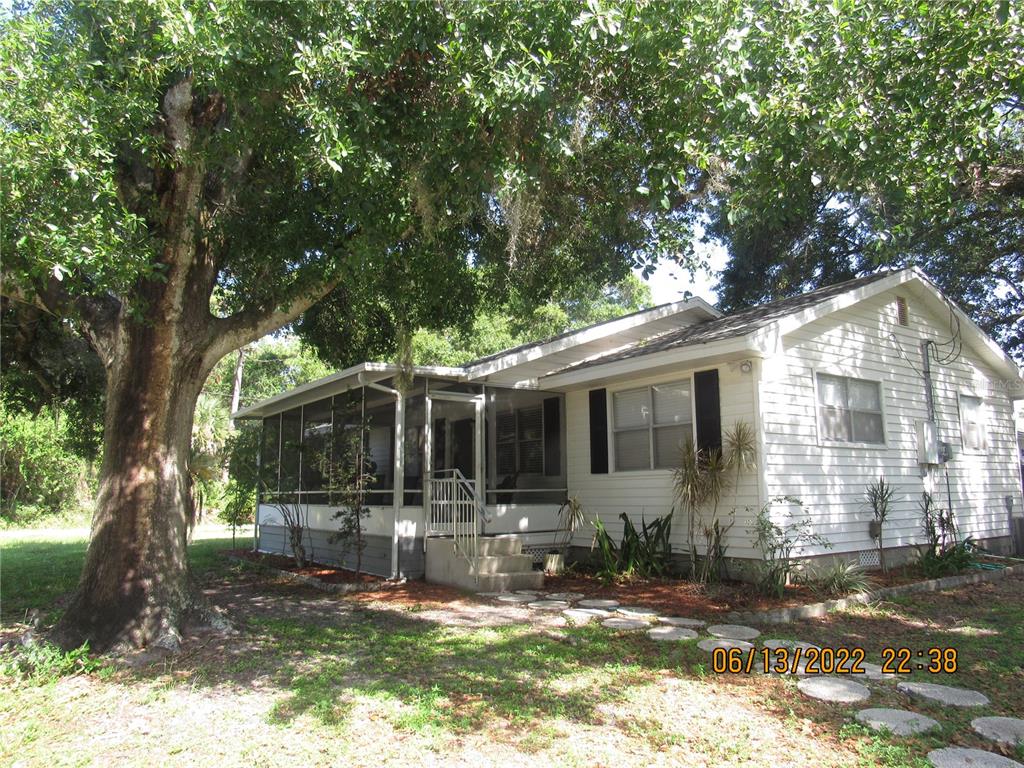 Your true Florida Cottage with front screened porch