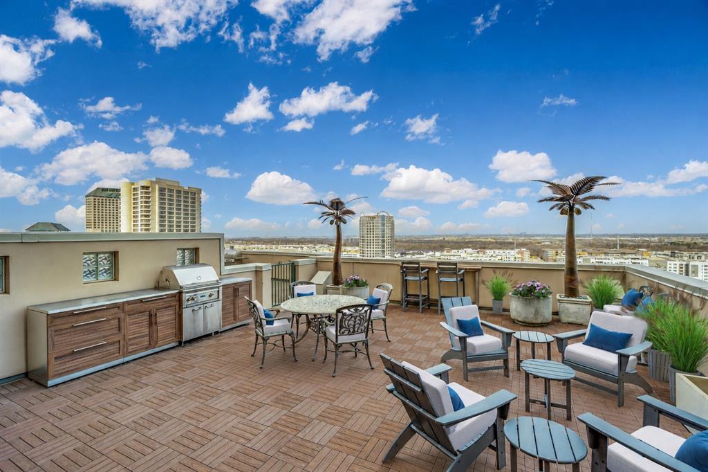 Elevated high-rise living in this 15th-floor penthouse at Grand Treviso, offering panoramic views on two sides of the residence and coveted east-facing views overlooking Lake Carolyn and the Las Colinas waterways. This unique home in the sky provides an impressive level of privacy along with an open, light-filled floor plan ideal for entertaining and everyday living. Large windows fill the living and dining areas with natural light and sweeping views, complemented by hardwood and designer flooring, custom lighting, and refined finishes throughout. Kitchen features KitchenAid appliances, induction cooktop, double ovens, breakfast bar, & adjoining dry bar, an ideal setting for gatherings large or small. The residence offers two bedrooms and two-and-a-half beautifully remodeled bathrooms. Each bedroom includes private study or sitting area. The primary suite features a spacious custom California Closet system and a spa-inspired bath designed as a private retreat. Remarkable outdoor living with more than 700 square feet of private terrace space. The expansive main terrace, complete with a grilling station and tranquil water feature, provides a setting for large private parties overlooking Lake Carolyn and the surrounding skyline. Also included are two premium parking spaces a separate private storage room located on the 3rd floor, valued at more than $20,000. Grand Treviso offers a true lock-and-leave lifestyle with 24-hour concierge service and an impressive collection of resort-style amenities, including a rooftop pool and spa, outdoor fireplace & grilling area, fitness center, coffee lounge, Grand Salon, business center, and conference room. Within the master-planned Las Colinas community with private security patrol, this exceptional penthouse is near the scenic canals, restaurants, shopping, and entertainment. With convenient access to six major highways, DFW International Airport, Love Field, and more than 100 Fortune 500 companies in the surrounding area.