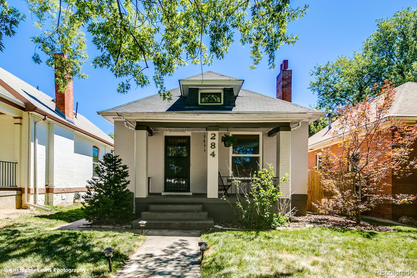 **Charming Updated Bungalow in Denver Country Club – Just Blocks from Washington Park**Move-in ready and ideally located just two blocks from the heart of Washington Park, this beautifully maintained brick bungalow offers timeless appeal and modern updates. Nestled slightly above street level, the home boasts great curb appeal and a welcoming presence.  Inside, you’ll find stunning hardwood floors throughout, newer windows, and a bright, functional layout featuring two bedrooms and one full bath. The updated kitchen is a highlight, showcasing crisp white cabinetry, quartz countertops, stainless steel appliances, and a charming touch of exposed brick. A versatile bonus room provides the perfect space for a home office, creative studio, or reading nook. Step outside to enjoy Colorado’s seasons on the covered back patio, or gather with friends around the built-in fire pit for cozy outdoor entertaining. Additional features include a newer oversized two-car detached garage accessed via the alley, a newly installed roof, radon mitigation system, and vapor barrier. The furnace has been professionally cleaned and serviced by a licensed contractor. Located across the street from highly-rated Steele Elementary and just blocks from the Cherry Creek Path, this home offers the perfect blend of classic bungalow charm and urban convenience.