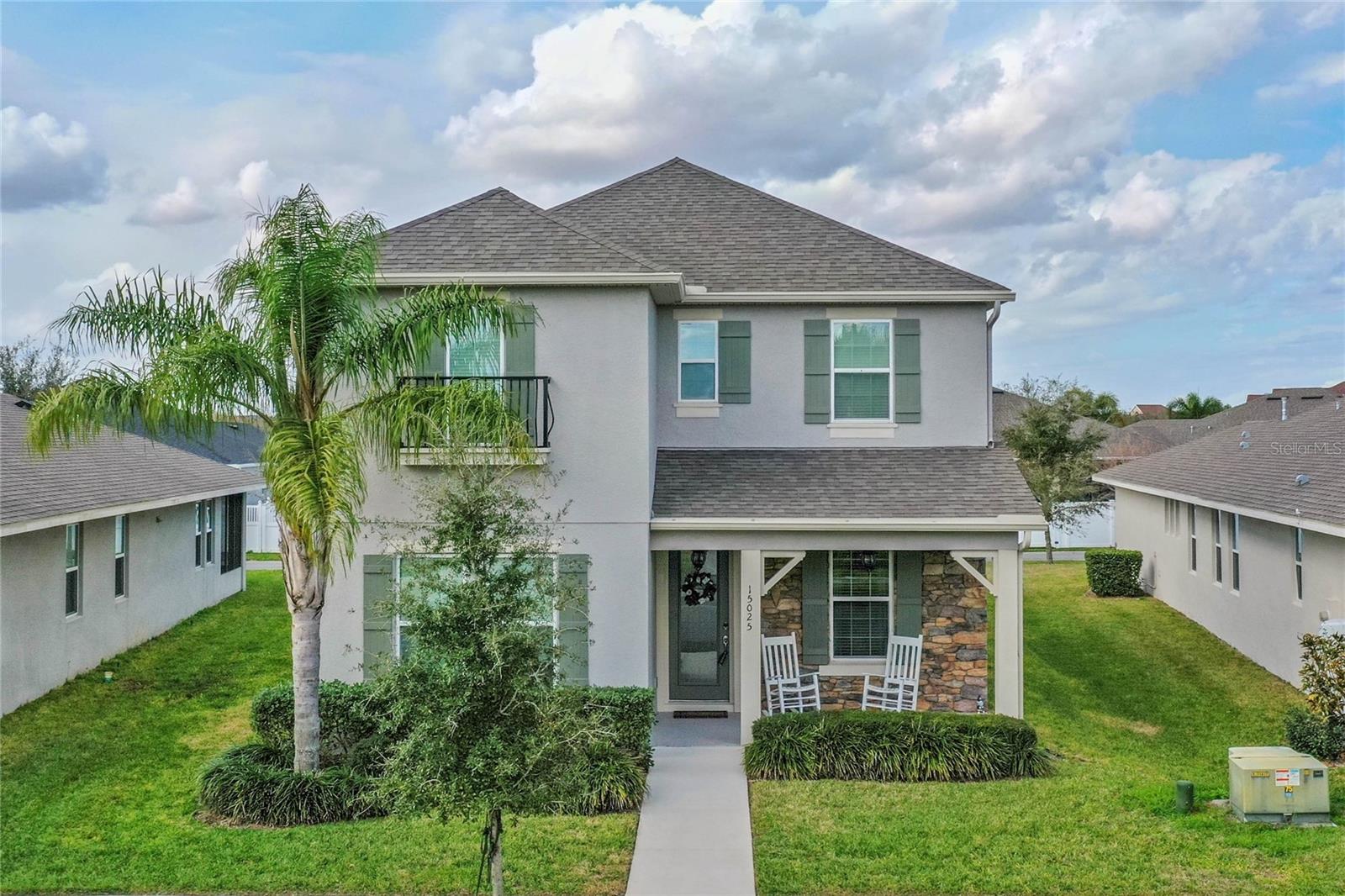 Under contract-accepting backup offers. Disney Fireworks from your front window! This 4 bedroom home PLUS OFFICE/FLEX SPACE in the desirable Summerlake neighborhood is ready for you to call home! TOUR THE HOUSE WITH THE VIRTUAL TOUR LINK. One step in and the modern finishes will catch your eye, from the new luxury vinyl flooring throughout the downstairs living spaces to the GOURMET KITCHEN. The Primary Suite is located on the main floor, and features a walk-in closet, dual sink vanity, and a LARGE SHOWER. At the front of the house, you’ll find the 5th room, a flex space that is perfect for your home office, den, or separate sitting room. The heart of this home is the open concept kitchen and family room, where the family cook will feel like part of the action overlooking the family room while preparing meals on the GAS STOVE and DOUBLE OVEN, with generous cabinetry storage and counter space, an eat-at island, and a large WALK-IN PANTRY. Off the kitchen you have a dinette for table meals, as well as access to your covered screened-in patio, making grilling burgers and summer gatherings a breeze!  If you need that secondary upstairs loft or living space, this house has it---perfect for movie nights, a game room, or large playroom. Also, upstairs, you’ll find 3 secondary bedrooms (2 with step-in closets), as well as a full bathroom with double sink vanity and separate water closet. There is no CDD fee at Summerlake, and the reasonable HOA fee includes exterior lawn care and routine mulching, leaving you more time to enjoy the neighborhood’s premium amenities that include a resort-style heated pool and sundeck, splash pad, fitness center with lake view, clubhouse, sports courts and fields, fishing pier, and various dog parks and playgrounds, located just 1 street over from your new home! Besides that, community events happen regularly throughout the year like movie nights, food trucks, garage sales, and holiday festivals. Just outside the neighborhood is the amazing Hamlin shopping area with dozens of stores and trendy restaurants, a movie theater, Publix, Walmart, Starbucks, and more! Large walking/jogging paths make it easy for active individuals to enjoy them without having to drive. On top of that, some schools are located within the neighborhood, and there is a hospital nearby. Plus, you are literally just minutes from Disney property. Come see your new home before someone else does!