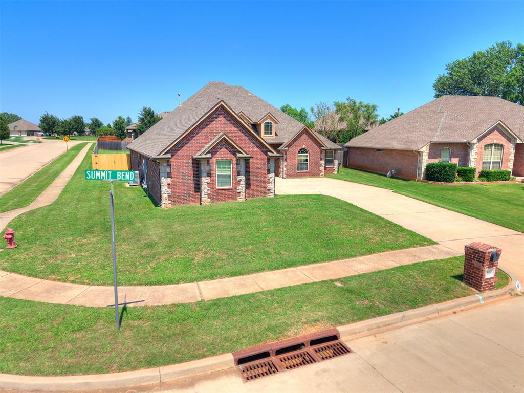 Welcome to an exceptional home in the highly sought-after Summit Lakes community, offering an incredible floor plan and one of the largest backyards in the neighborhood. Situated on an impressive 0.39-acre lot and less than three miles from the University of Oklahoma, this home provides the perfect combination of space, privacy and convenience. Inside, you will find 4 bedrooms, 3 full bathrooms, 1 half bathroom, multiple living areas, and a true dedicated study. The study is beautifully accented with wainscoting, creating an ideal home office. The primary suite occupies its own wing of the home and features double vanities, a jetted soaking tub, separate shower, and separate his-and-her closets. On the opposite side of the home, two additional bedrooms share a full bathroom. Upstairs adds even more versatility with an oversized flex room. A convenient half bathroom is located nearby, while double glass doors open to a private balcony overlooking the expansive backyard. Also upstairs is the fourth bedroom featuring its own private full bathroom, making it an excellent guest suite or private space for an older child. Additional highlights include a large laundry room with utility sink, three-car garage, abundant storage throughout, and an exceptionally spacious backyard with plenty of room for outdoor entertaining, recreation, or simply enjoying the additional space. Beyond the home, Summit Lakes offers a lifestyle that continues to make it one of Norman's most desirable communities. Enjoy scenic walking trails winding throughout the neighborhood, multiple stocked fishing ponds and lakes, neighborhood parks, and beautiful outdoor spaces. Spend evenings walking the trails, fishing close to home, or simply enjoying the peaceful surroundings. With its spacious lot, versatile floor plan, private bedroom arrangement, multiple living spaces, and convenient location near OU, this Summit Lakes home offers a combination of features that is increasingly difficult to find.
