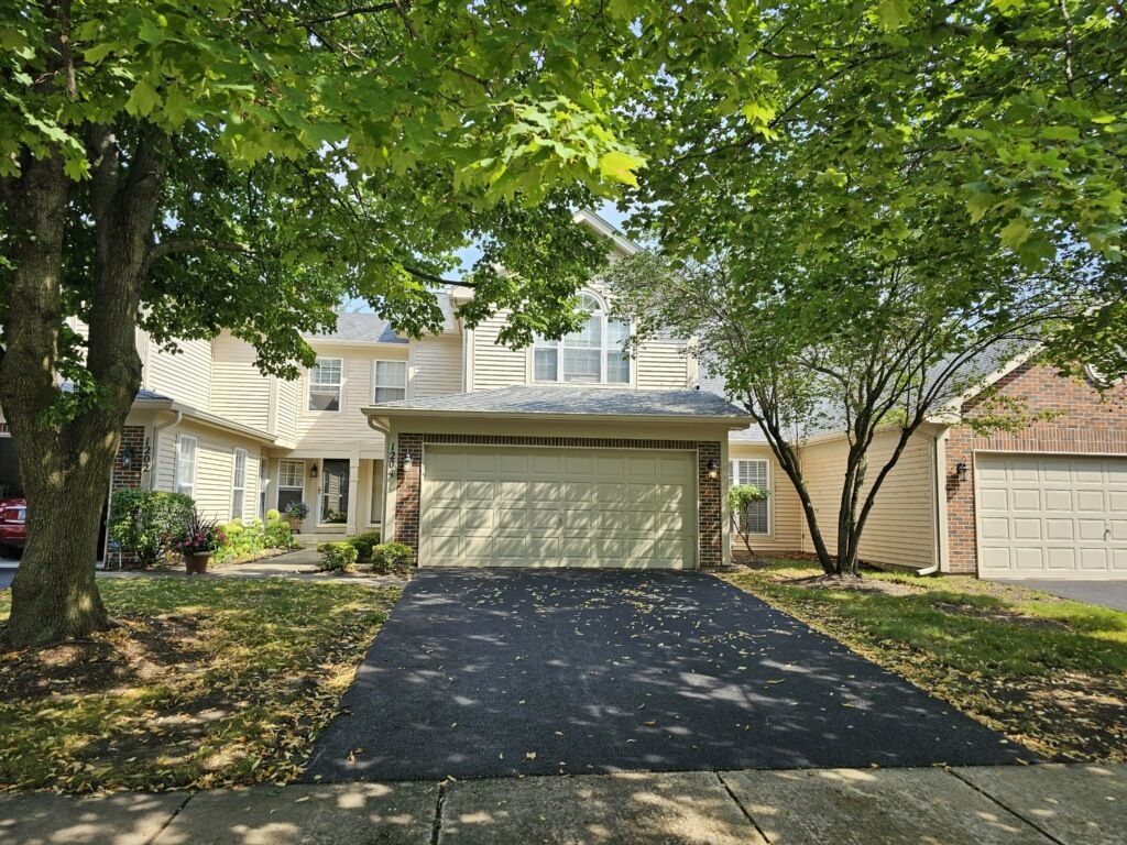Sharp Townhome In Desirable Cobblers Crossing Neighborhood. Open and Airy Floor Plan Features 2 Bedrooms, 2.1 Baths, 2-Story Family Room with Fireplace and Spacious Loft. Wonderful Location Backing to Beautiful Wetlands! Kitchen with Hardwood Floors, Stainless Steel Appliances and Walk in Pantry! Separate Eating Area with Hardwood Floor! Dining Room With Sliding Glass Door to Patio Overlooking Beautiful Back Yard! Great Spot For Entertaining! 1st Floor Laundry with Newer Washer & Dryer! Attached 2 Car Garage! Spacious Vaulted Primary Suite Features Large Walk-In Closet and Private Bath with Double Sinks, Whirlpool Tub and Separate Shower! Generously Sized Bedroom 2 with Ample Closet Space and Serene View! Large Loft Is Terrific Office Space and Overlooks Family Room! Newer  Furnace and Roof.