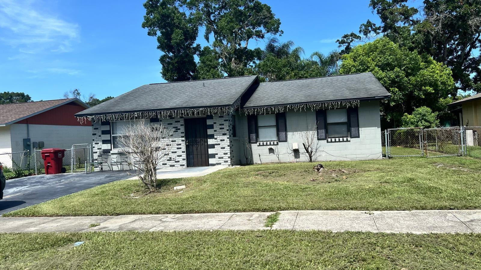 Motivated seller! Well-built concrete block home in the heart of Plant City, great for investors or a buyer ready to build equity. This 3-bedroom, 2-bath residence offers 1,348 sq ft of living space on a 0.16-acre (7,080 sq ft) lot with 60 ft of frontage. Features include central heat and air, a composition shingle roof, and a screened 52 sq ft porch. A patio and separate utility building add flexibility for storage or outdoor living. Effective year built 2001. Zoned R-2 and located in Flood Zone X (unshaded). Convenient to downtown Plant City with easy access to Tampa via I-4. Priced to move — bring offers. Buyer/buyer's agent to verify all measurements, zoning, and lot details.