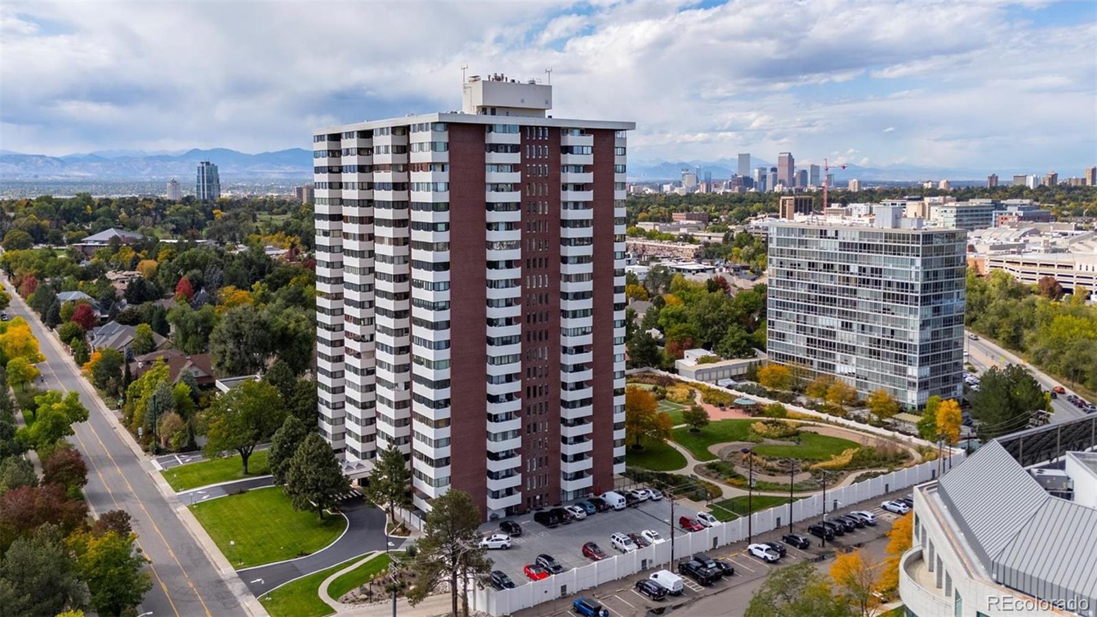 Welcome to the newly revamped Polo Club Condominiums in the heart of coveted Cherry Creek with one of the most distinctive interior spaces in all of Cherry Creek. This extraordinary property represents a rare opportunity: 2 individual residences thoughtfully combined & completely customized to create one spectacular 6,000-square-foot home in one of Denver's most prestigious & desirable neighborhoods.  The result is full-service condo living on an entirely different scale.  Expansive living & entertaining spaces flow beautifully, creating the feeling of a custom luxury home while offering the convenience, security & sophisticated lifestyle of premier condominium living. Every space has been designed with intention. Generous proportions, exceptional finishes & custom details create an atmosphere that is elegant yet remarkably comfortable—equally suited for intimate evenings at home & impressive large-scale entertaining.  Upon entering, you are welcomed home to a light & bright space open to the high-end luxury kitchen.  The 4 sunrooms offer Southern exposed, natural light & panoramic views of Denver's Southern Front Range & Washington Park in the near distance.  The floorplan flows, home office spaces & your entertaining mecca.  A complete bar set-up to offer guests an exquisite experience as they relax in your game room soaking in the views.  Enjoy the endless possibilities of a wine cellar, studio space, your choice & all easily envisioned.  There are 3 primary suites with views, abundant closets & space.  The building also offers 3 guest suites on the first floor to offer your out-of-town guests.  There is a gym, with upgraded equipment, a conference room & party room that is the perfect spot to watch the big game.  Indoor pool & hot tub with lounging areas.  Just a short walk is Cherry Creek—Denver's premier destination for luxury shopping, acclaimed dining, galleries, boutiques & an exceptional urban lifestyle.  A short ride to Denver Performing Arts & Downtown.