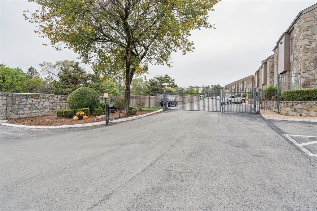 Perfectly situated in a gated community with quick access to NW Expressway and I-44, this move-in-ready condo offers both convenience and comfort. Freshly painted with an open-concept layout, the home features 2 bedrooms, 2 full bathrooms, and a bright, inviting living and dining space ideal for everyday living or entertaining. Residents enjoy beautifully maintained grounds and outstanding amenities, including a pool, fitness center, clubhouse, and outdoor dining areas. Low-maintenance living in a prime location — don’t miss your chance to call this one home!