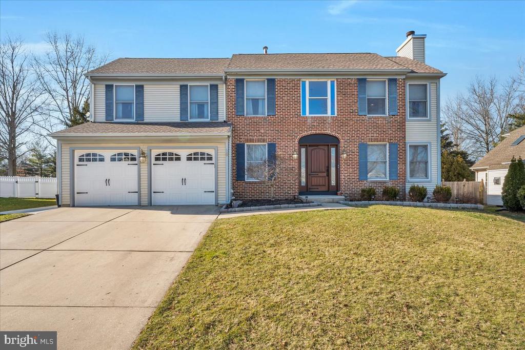 Welcome to this beautiful 4-bedroom, 2.5-bath home located in the highly desirable Dominion section of Marlton, just minutes from major roadways, shopping, and dining. Step inside the dramatic two-story foyer with hardwood flooring and immediately feel the warmth and space this home offers. The sunken living room features a cozy gas fireplac perfect for relaxing or entertaining guests. The formal dining room showcases elegant custom woodwork and overlooks the private backyard. The updated eat-in kitchen is a chef’s dream, complete with a Viking gas range, stainless steel appliances, granite countertops, and a stylish tile backsplash. The open layout allows guests to gather nearby, whether enjoying conversation at the table or unwinding in the inviting family room featuring a wood-burning fireplace, skylights, and direct access to the rear patio. Conveniently located just off the garage is a large custom laundry and mudroom, offering excellent functionality with additional storage and the perfect drop zone for coats, shoes, and everyday organization. Upstairs, retreat to the spacious primary suite with new neutral carpeting and a luxurious ensuite bath highlighted by a relaxing Jacuzzi tub and large walkin closet. Three additional generously sized bedrooms offer ample closet space while sharing an oversized hall bath. The beautifully remodeled finished basement adds exceptional living space, featuring luxury vinyl plank flooring, a fireplace, dedicated office, custom bar area, and plenty of room for entertaining, relaxing, or working from home. Enjoy outdoor living in the fully fenced backyard, which is ideal for pets, play, and gatherings. Major updates include newer HVAC systems and a new front door offering peace of mind and low-maintenance living. Schedule your private showing today!
