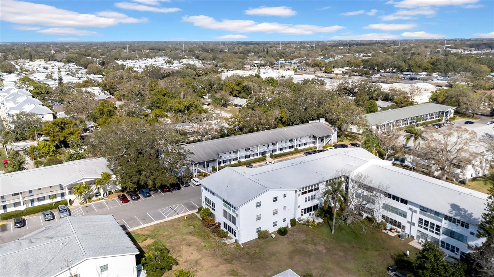Welcome to Downtown Dunedin paradise living at its finest, located in the Douglas Arms Condominium Complex, Unit Number 203. This quaint, well-appointed, updated condo offers two bedrooms and one bathroom. Newly updated with a replaced A/C unit, new flooring, fresh paint, and a brand-new stove. It comes fully furnished and turn-key ready—just bring your personal items and settle right in! The condo features a huge back bonus room that can easily serve as an office or a 3rd bedroom. Plus, it’s just steps away from all the "must-see" sites in Dunedin, Clearwater, and Tarpon Springs! Enter the living/dining area, where you’ll find a full-size table with four chairs. The living room boasts all-new furniture, including a full-size sofa (also a sleeper), three sitting chairs, and a flat-screen TV, all of which will convey with the property. To the right of the living/dining area is a well-appointed kitchen with all the must-haves: refrigerator, dishwasher, oven, coffee maker, blender, toaster, and more, all of which will also convey. Off the main hall, you’ll find the guest bedroom, which offers a full bed set, closet, dresser, mirror, and more. The master bedroom, located at the rear of the home, features a queen-size bed, flat-screen TV, closet, dresser, side tables, lamps, and mirror. Both bedrooms provide natural light, ceiling fans, and privacy shades. Between the two bedrooms, you’ll find additional storage space in the closet and pantry. The bathroom has a full-size shower/tub combo, vanity, and toilet. Surrounding the condo, you’ll find lush, mature foliage and vegetation throughout the community, with walking paths between the complexes that provide a shortcut to get to your destinations quickly. The community pool is the perfect way to spend an afternoon, offering plenty of loungers to bask in the tropical weather. When choosing a place to stay in Dunedin, it's essential to find a location that offers quick access to everything. This condo is located just a few blocks from all the action, so you can leave your car in the parking spot and experience Dunedin on foot or bike! This condo is the perfect, turn-key option, with all utilities included in the HOA except electric. Make your appointment to come and experience the comfort and convenience of this fully furnished condo! A list of all furnishings and extras are provided.