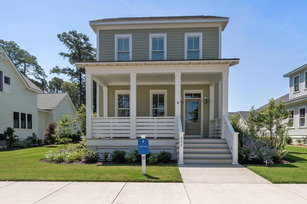 Welcome to your dream home in the sought-after Bayside Village neighborhood of Bay Creek! This stunning, move-in-ready contemporary residence is filled with charm.Step inside to a foyer that flows into a spacious kitchen and living room bathed in natural light, thanks to the impressive French doors that span the entire back wall. A detached 2 car garage at the rear of the home and additional attic space ensure you'll have plenty of room for storage! As a turnkey investment, this property already has rentals booked for 2025! This home is offered FULLY FURNISHED with a golf cart and kayak included! Resale property that has been recorded as a Required Membership Property. Therefore, a subsequent purchaser would be required to join and activate membership within 30 days after closing.