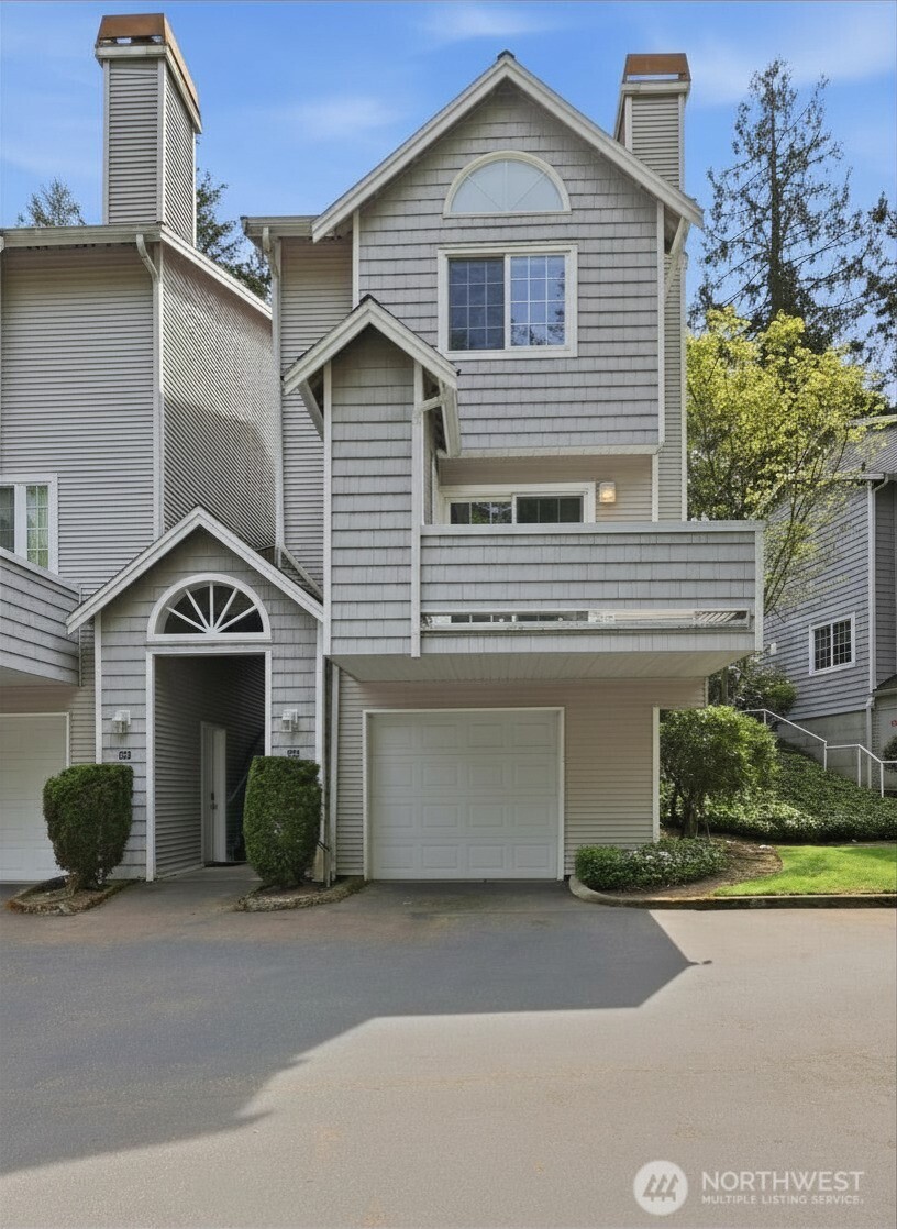 Comfortable indoor-outdoor living meets commuter-friendly convenience in this updated standalone Issaquah townhome. Refreshed kitchen, updated LVP flooring, and thoughtfully designed living spaces create a move-in ready feel with warmth and functionality throughout. Mature trees and established shrubs alongside the home offer added privacy and help keep the home cool during sunny summer days. Vaulted ceilings highlight the spacious primary suite with walk-in closet and private bath, while the ensuite second bedroom provides versatility for guests, work-from-home setup, or additional living needs. Private patio invites outdoor dining and BBQ gatherings, complemented by a balcony with convenient storage closet. Rare tandem 2-car garage with extra storage sits directly below the unit. Conveniently located near I-90, Issaquah Park & Ride, Tibbetts Valley Park, shopping, restaurants, and recreational amenities for easy access to both daily essentials and outdoor activities.