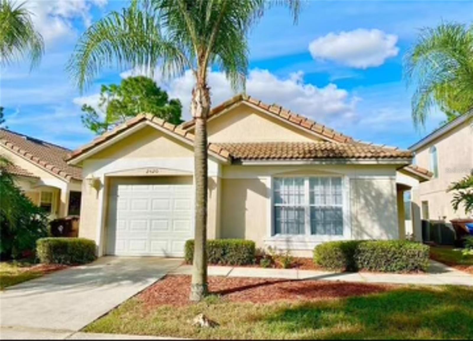 Welcome to this well-maintained home in the desirable Villas de Augustine community in Haines City. The residence features an open-concept layout with spacious living and dining areas, a functional kitchen with ample cabinetry, and generously sized bedrooms. Tile and Vinyl flooring throughout enhances durability and ease of maintenance. The primary suite includes a private en-suite bathroom and walk-in closet. Additional highlights include an attached garage, and a private screened-in pool with enclosure overlooking a scenic golf course view—ideal for relaxing or entertaining. Recent renovations like a new AC unit installed in 2022, a new garage door replaced in 2023, a pool deck repainted in 2024, and new stainless steel appliances in 2025.Villas de Augustine is a gated community offering a community pool and clubhouse, with the HOA including lawn care for low-maintenance living. Conveniently located near US-27, shopping, dining, schools, and Central Florida attractions, with easy access to I-4. Suitable as a primary residence, seasonal home, or investment opportunity. Updated pictures coming soon.