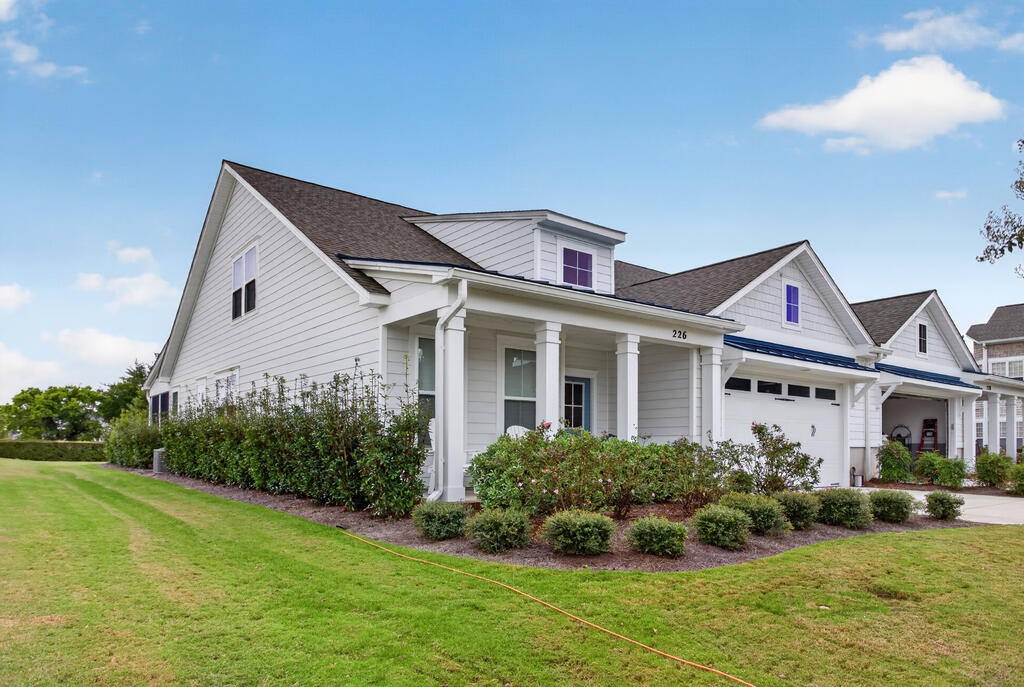 RARE OPPORTUNITY IN THE FAIRWAYS! Why Wait? This sought-after 2021 duplex, built with quality craftsmanship by Beacon Homes, offers a highly desirable floor plan and is ready for its next owner.  Featuring 4 bedrooms and 3.5 baths, this spacious home offers a first-floor primary suite with an ensuite bath, plus two additional generously sized bedrooms on the main level. Upstairs, you'll find a versatile fourth bedroom with a full ensuite bath—ideal for guests, a home office, flex space, or private retreat. The home also offers hardwood flooring, carpeting in the bedrooms, and abundant storage, including a large attic space. A two-car garage with an additional storage closet provides plenty of room for bikes, beach gear, golf equipment, and all your coastal-lifestyle essentials. Step outside to enjoy the screened porch, perfect for morning coffee or unwinding after a day at the beach. The porch extends to a patio area, creating additional space for grilling, dining, or entertaining. A convenient propane line is already in place for easy grill access. Beyond the patio, the backyard opens to a large grassy common area, adding to the spacious feel and outdoor enjoyment. And then there's the Bay Creek lifestyle. Membership provides access to an impressive collection of amenities and recreational opportunities designed to make coastal living feel like a permanent vacation. From enjoying time on the water and outdoor recreation to gathering with friends and neighbors, Bay Creek offers a true sense of community and an active coastal lifestyle. It's the kind of place where you can slow down, get outside, make memories, and enjoy all that the Eastern Shore has to offer. Whether you're looking for a primary residence, second home, or investment property, this Fairways villa offers flexibility, quality, and an excellent open floor plan. Combine that with the Bay Creek lifestyle, and you get more than a home; you get the coastal life you've been waiting for! Move-in ready, beautifully appointed, and available now. Don't wait to make this Bay Creek villa your own!