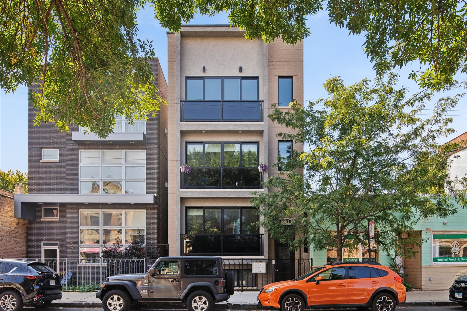 Experience the best of city living in this 2024 delivered new construction, extra-wide penthouse in the heart of Roscoe Village. Spanning approximately 2,400 sq. ft., this 3-bedroom, 2.1-bath residence is designed for both everyday comfort and exceptional entertaining.    Enjoy three private outdoor spaces, including two rooftop decks and a balcony off the primary suite.   The fourth-floor family room provides direct access to rooftop decks on both sides, seamlessly blending indoor and outdoor living. The full rooftop retreat featuring a pergola, TV seating area, and utilities plumbed for gas and water-perfect for al fresco dining, entertaining, or relaxing under the stars.    Inside, a chef's kitchen showcases 48-inch custom cabinetry, quartz countertops, and a premium Sub-Zero, Wolf, and Bosch appliance package. Natural light pours through floor-to-ceiling Pella windows, enhancing the home's soaring ceilings, custom lighting, and 8-foot solid core doors.    The primary suite offers a spacious walk-in closet with custom shelving, a spa-inspired bath with heated floors, double vanity, soaking tub, separate shower, and its own private balcony. All bathrooms throughout the home feature radiant heated flooring for a touch of everyday luxury.    An easy walk to Hamlin Park and Fellger Park, and just a short stroll to the shops and restaurants of Roscoe Village, this penthouse combines neighborhood charm with elevated modern living.     One Garage space included.