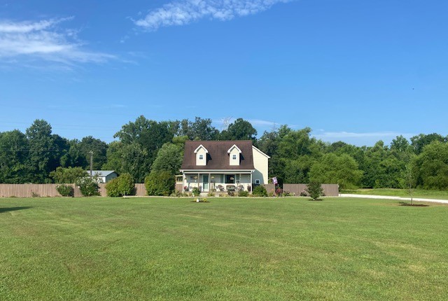 Welcome to a truly unique country retreat offering the perfect blend of privacy, beauty, and convenience. Situated on approx. 21+/- acres, this charming 3-bedroom, 3-bath home is surrounded by lush landscaping, peaceful mountain views, and a creek running through the property. Inside you will find a spacious open floor plan, a kitchen that any cook would love, and space for everyone to spread out.  Spend your summer days relaxing by the above-ground pool, enjoying the abundance of wildlife as they come out and play. A small barn makes this property ready for your animals. So, bring them along and enjoy plenty of room to roam. You'll love the quiet country feel while still being conveniently located close to town and the Nissan plant.  Whether you've been dreaming of a mini farm, a private retreat, or simply the outdoors, this one-of-a-kind property offers endless possibilities. Creek, pool, acreage, mountain view, and room for the horses, country living doesn't get much better than this!