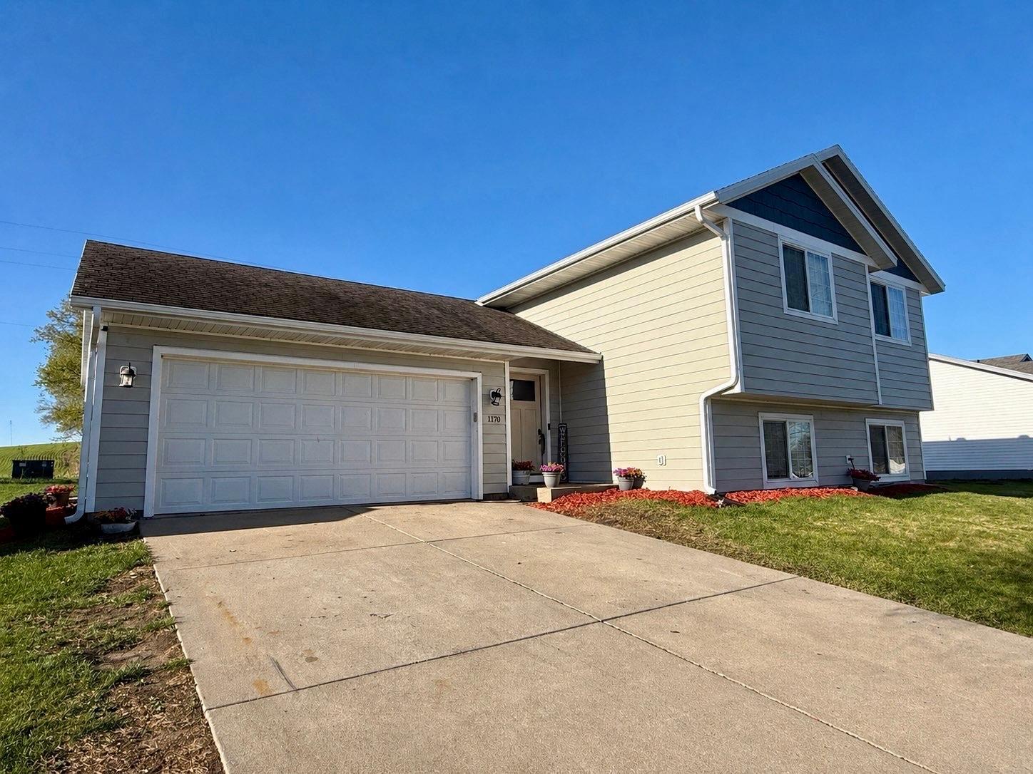 Welcome to this charming home in a desirable location on the south side of Paynesville! Situated on a quiet street, this property offers a peaceful, country-like setting while remaining conveniently close to town. Enjoy the added convenience of a walking path located directly behind the home.Offering over 2,000 finished square feet, this home features 4 bedrooms and 2 full bathrooms. The spacious entryway includes a built-in closet, providing plenty of room for coats, shoes, and everyday storage.The lower level features two generously sized bedrooms, a full bathroom, and a large family/entertainment room—perfect for relaxing or gathering with family and friends.Outside, you'll find a two-stall garage with an additional separate room featuring a utility sink, offering excellent space for hobbies, projects, or extra storage. A charming storage shed complements the home and features matching colors and durable LP SmartSide siding.This well-maintained home combines comfortable living, functional space, and a peaceful setting while keeping all the conveniences of town close by. Don't miss the opportunity to make this home your own!