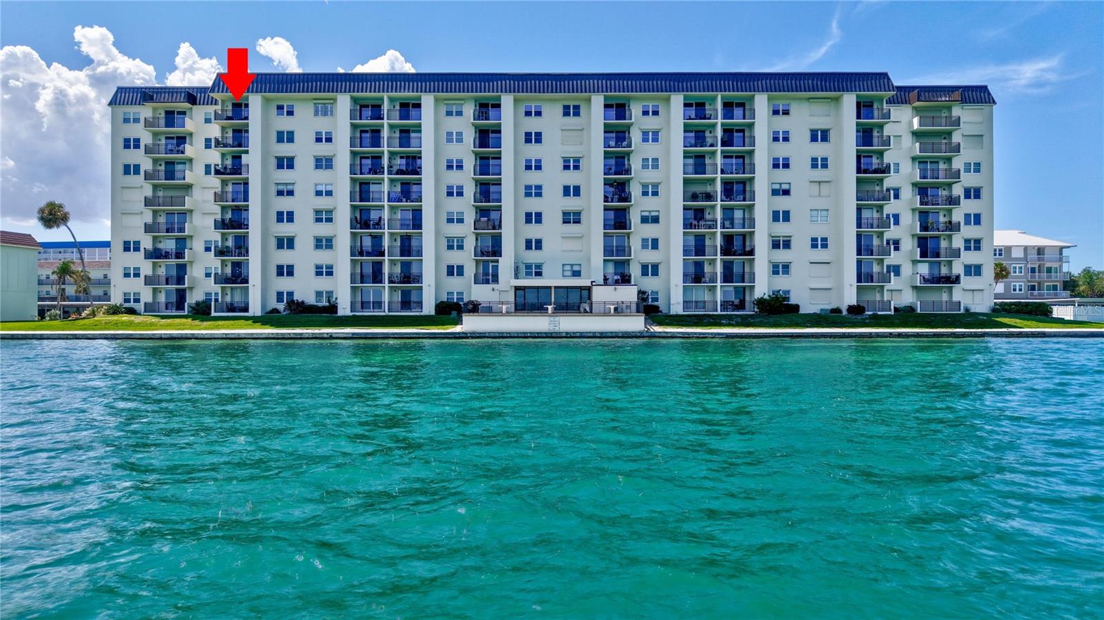 You’ve worked hard—now it’s time to enjoy the lifestyle you deserve. Welcome to your waterfront sanctuary at Royal Stewart Arms, a sought-after 55+ community in Dunedin, ideally located just outside the entrance to iconic Honeymoon Island State Park.Perched on the top floor of the Haig Building, this beautifully updated residence offers breathtaking open-water views and a wonderful sense of peace and privacy. The Haig Building sits on elevated X flood zone property and has never flooded, providing an added sense of confidence and security. The building has also completed its required milestone engineering and reserve studies, along with an impressive $4 million renovation. Best of all, the approximately $40,000 unit assessment has been paid in full.Inside, you’ll find an inviting, move-in-ready home featuring granite countertops, stainless steel appliances, and upgraded tile flooring throughout. But the true centerpiece is the view. There’s something special about looking out over open water—a sense of calm that never gets old. Start your mornings and end your evenings from your own private waterfront balcony, thoughtfully designed so neighboring balconies remain out of sight, creating an unusually private outdoor retreat.At Royal Stewart Arms, you’re not simply buying a home—you’re embracing a lifestyle.Residents enjoy an exceptional collection of amenities, including a private fishing pier, waterfront swimming pool, tennis courts, shuffleboard courts, horseshoe pits, and a freestanding clubhouse surrounded by panoramic water views. The clubhouse features a fitness center, billiards, ping pong, air hockey, social activities, and gathering spaces, making it easy to stay active and connected.The Haig Building even offers its own waterfront library and social room, complete with a large outdoor balcony where residents can take in spectacular sunrises and sunsets—and perhaps spot a dolphin or manatee passing by. Even the community laundry room comes with a water view and its own balcony!And then there’s your extraordinary neighbor: Honeymoon Island State Park, nearly 3,000 acres of natural Florida beauty just next door. Walk, bike, or take a quick drive and spend the day exploring miles of pristine shoreline, nature trails, picnic areas, and some of the area’s most beautiful beaches.Catch the ferry to world-famous Caladesi Island, departing throughout the day, or explore favorite destinations within the park such as South Beach, Oasis Beach, Honeymoon Café, and the dog-friendly beach. Nature lovers and bird watchers will appreciate the scenic hiking trails, while the Nature Center offers a fascinating look into Honeymoon Island’s history, wildlife, and unique coastal environment.When the beach day winds down, the fun doesn’t have to stop. The nearby Dunedin Causeway is home to popular local destinations including Frenchy’s Outpost Bar & Grill and the laid-back High & Dry Grill & Tiki Bar.Waterfront living. Island beaches. Nature. Recreation. Community. Sunrises, sunsets, dolphins, and salt air—all just outside your door.What are you waiting for? It’s time to do what makes your soul shine.