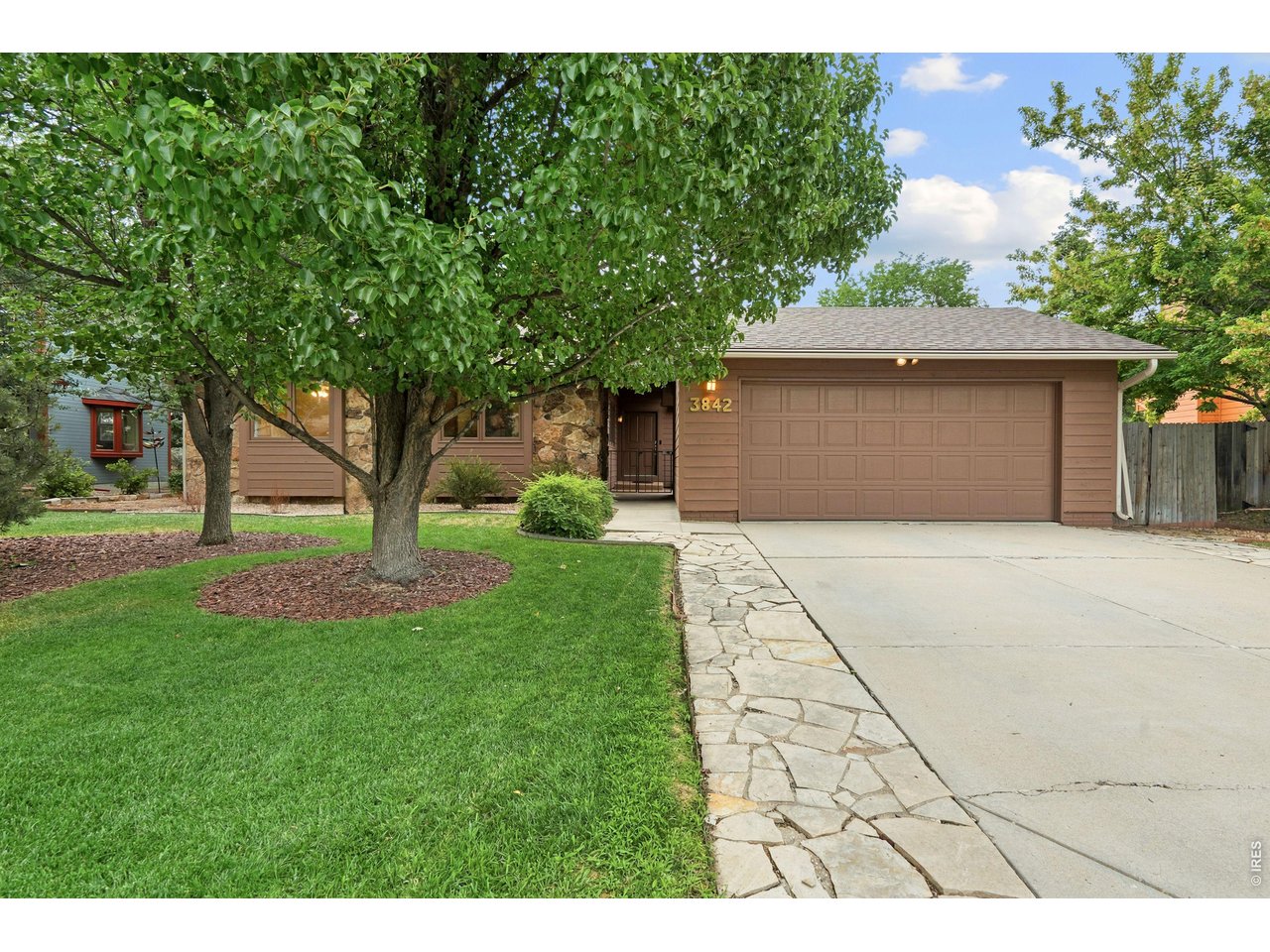 Just an incredible location in SW Fort Collins within the desirable Four Seasons neighborhood, this 4 bedroom 3 bathroom ranch style home with only one owner needs to be toured to appreciate it! The location is hard to beat....just blocks away from Lopez Elementary, Troutman Park and the Troutman MAX Bus Rapid Transit Station, with service to Old Town! The two-car detached garage provides a great courtyard, a quiet spot for morning coffee, or to relax and unwind at the end of the day. The home originally constructed for the builder to move in with 2x6 exterior walls, also boasts 3 bedrooms and 2 bathrooms on the main level including the primary bedroom, bathroom and walk in closet, tons of natural light in the living room which includes a door out to the courtyard, and a gas fireplace, tile in both the breakfast nook and kitchen, with wood floors in the dining room. The basement includes both a family room and recreation/game room (a hidden chest freezer as well inside the hutch), with ample closet storage in both. An additional bedroom and 3/4 bathroom are also included in the basement. The roof replaced end of 2018, and both the furnace and AC end of 2022! The home also includes ceiling fans in the kitchen, dining nook, living room and all upstairs bedrooms, in addition to a whole house fan! The home also includes an active radon mitigation system with vapor barrier in the crawl space. The oasis backyard includes both a trex deck and trex walkway around one side, in addition to a flag stone walkway between the deck and the courtyard! The home has been pre-inspected. Come take a look!