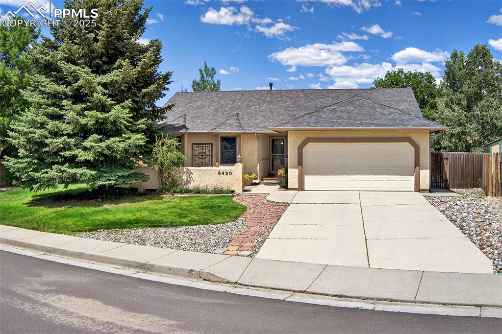Sparkling clean, like brand new, ranch style 3 bedroom, 2 bathroom home. Main level living at its finest with bright and open great room concept, vaulted ceilings, flawless hardwood floors, custom finishes. Situated on a large, level, manicured, fenced lot on a beautiful tree lined street.
•on suite in primary bedroom 
•main level laundry 
•gas log fireplace with mantle 
•hardwood floors throughout 
•garage door opener 
•open concept living 
 Enclosed private front courtyard, a huge 15’ X 22” patio right off  the dining area and an attached 2 car garage that walks directly into the kitchen. Finished basement with storage and a family room.  Newer  roof with a class-4 hail resistant rating. This is a fabulous and unique find!