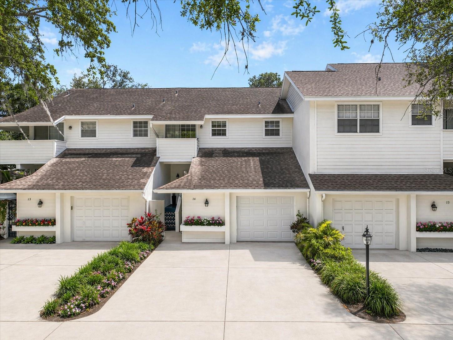 Located just steps from iconic Bayshore Boulevard, this beautifully updated townhome sits within Colony Oaks — a quaint, private enclave shared with just 14 other residences in the heart of South Tampa. The open-concept main floor features a modern kitchen with quartz countertops, stainless steel appliances, and a glass tile backsplash, which flows into the living and dining areas, anchored by a beautiful fireplace. Sliding glass doors open to the first of three private balconies overlooking a peaceful pond and community pool. Upstairs, you'll find a very spacious primary suite which includes a spacious walk-in closet, dual vanities, a separate water closet, and a quiet balcony perfect for starting or ending your day. Both bedrooms feature en-suite bathrooms and their own private balconies — a rare setup you don’t come across often. A second-floor laundry room adds everyday convenience. With three private balconies, water views, great natural light, and a location just minutes from Hyde Park, Downtown Tampa, and the waterfront, this is one of those opportunities that doesn’t come around often in South Tampa!