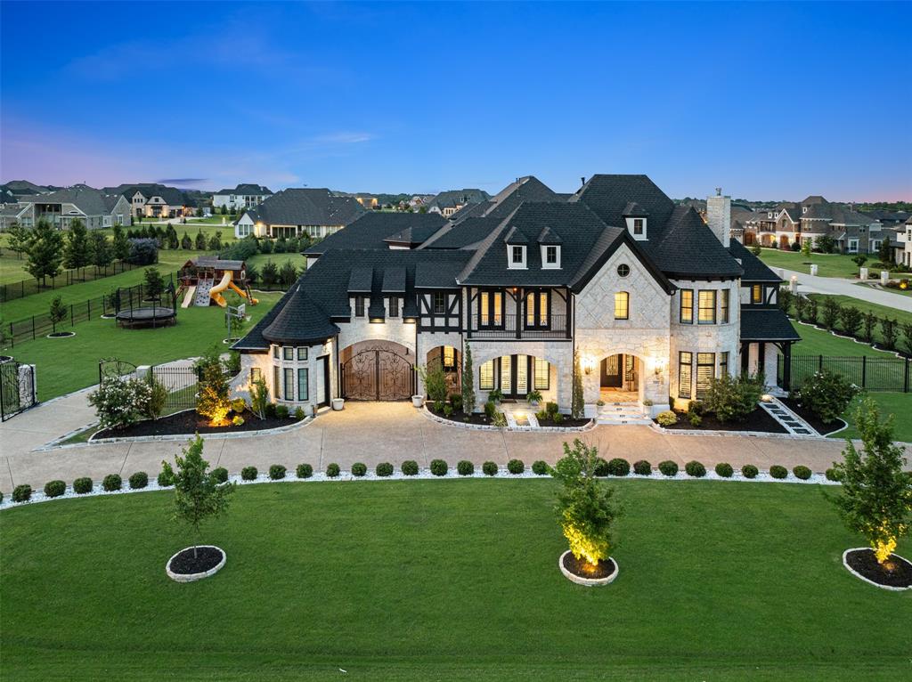 Welcome to this Distinguished Luxury Estate on 1-Acre Lot in Prestigious Kings Crossing! A True Sanctuary, where a Grand Governor’s Circular Driveway ushers you into Timeless elegance, Designed for Refined Living throughout! This remarkable Residence showcases 5 Spacious Bedrooms, 5.5 Bathrooms, 4 fireplaces, Media & Game Rooms, Wine Room, Executive Office, all thoughtfully crafted to blend classic sophistication, modern comfort & upscale resort-style amenities! Step inside to a Dramatic Double-Staircase Foyer w-gleaming Hardwoods, leading to Formal Living Rm w-Fireplace & Private Executive Office*Enter left to Formal Dining Rm & Custom Step-Down Wine Rm*Amazing Kitchen design for those w-special appreciation for Culinary Excellence! Complete w-both gourmet Chef's Kitchen AND 2nd Full Prep or Spice Kitchen to accommodate more aromatic, vibrant aspects of cooking*Main Kitchen offers abundant Cabinetry, Butler Pantry, Desk space, Huge Pantry, custom-designed Island, highlighted by Lighted Quartz Panels surrounding Island! Dual Staircases, Soaring Cathedral Ceilings crafted w-Majestic wood Trusses above the Breakfast-Dining Areas & Great Room featuring an exquisite Floor-to-Ceiling Stone Fireplace*Master Suite w-Fireplace, Luxurious Bath Escape! Ascend the signature Double Staircase to the 2nd floor, providing a 2nd Primary Bedroom w-EnSuite Bath, Small Office or Game Rm plus Bonus-Flex Rm*Three addt'l Guest Bedrooms & 3 Full Baths Up*For Entertainment, enjoy both a Large Game Room w-Wet Bar & separate Media Room w-Screen, Projector & Surround Sound Equipment...great spaces for both relaxation & recreation! Outdoor enjoy resort-style Living with a Sparkling Pool, Outdoor Kitchen, Expansive Covered Patios, Gas Fireplace...ideal for all-season entertaining! Custom Iron Gate entrance, 2-Car Garage plus porte cochère, Carport & 3rd Car Garage for plenty of parkking, privacy, security*Exterior Pergola w-Solar Panels (owned) for Energy Efficiency!
