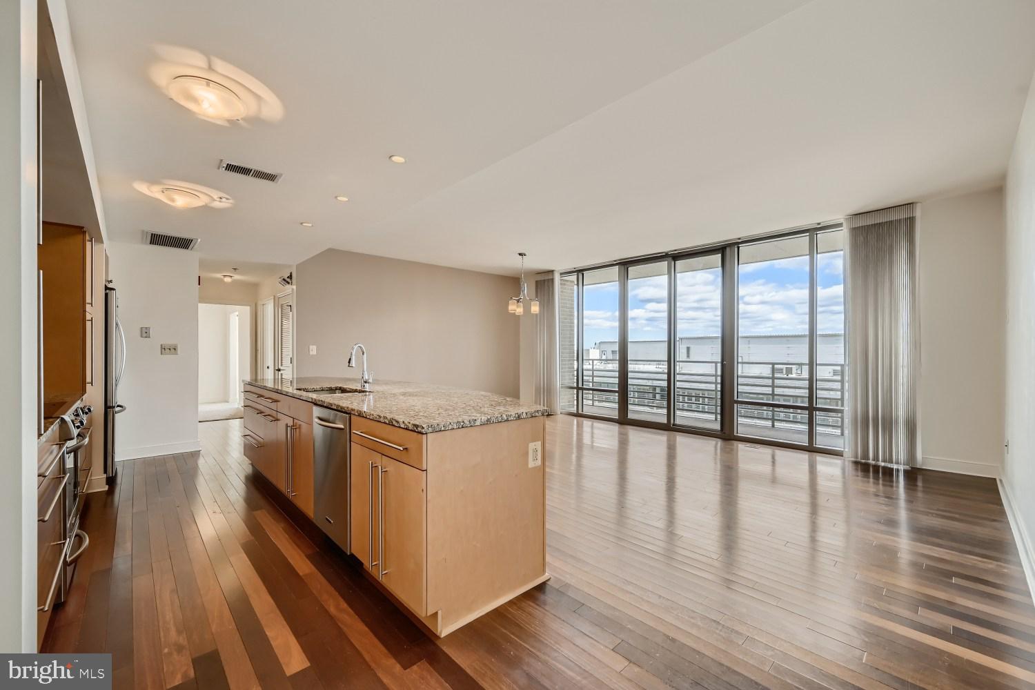 In the heart of Harbor East with 2 parking spaces and a storage unit.  This residence features a large open floor plan, with a deck that opens to your living space,  2 bedrooms and 2 baths. The home offers both comfort and convenience.  Step  right out of the building and into all the area has to offer....Waterfront restaurants, shopping, and endless activities--all within easy walking distance. Call today for a showing any day. We are happy to show on both Saturday and Sundays.OPEN HOUSE Saturday 2/21 from 11-1pm