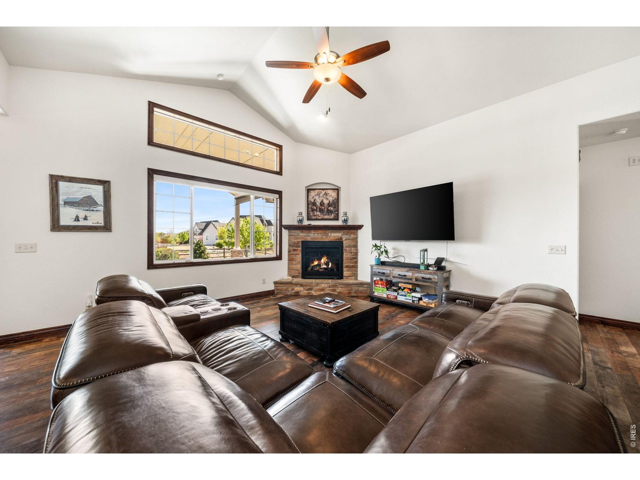 Beautifully designed ranch in Highpointe, ideally situated next to open space and offering a thoughtful blend of comfortable living and effortless entertaining. Inside, natural light fills the open, flowing floor plan, complemented by rich wood floors and well-appointed finishes throughout. The inviting kitchen features a center island, double ovens, pantry, and sunny dining nook, opening seamlessly to the spacious great room with a striking stone fireplace. A main-floor study with French doors provides a dedicated space for work or quiet retreat.The private primary suite offers a relaxing escape with a spacious walk-in closet and luxurious 5-piece bath featuring a jetted tub. The partially finished basement provides even more room to spread out, with a generous recreation room, additional bedroom and bath, wine storage room, and abundant storage with plenty of potential for future expansion. Outside, the vaulted covered patio creates an inviting extension of the living space, while the beautiful water fountain adds a peaceful backdrop to the lush, fenced backyard. There's plenty of room for entertaining, play, or simply enjoying the outdoors, and the oversized garage provides ample space for vehicles, gear, and toys. Highpointe offers an exceptional lifestyle with a resort-style pool and waterslide, kiddie pool, sports courts, and clubhouse, all with convenient access to trails, shopping, dining, and everyday amenities.
